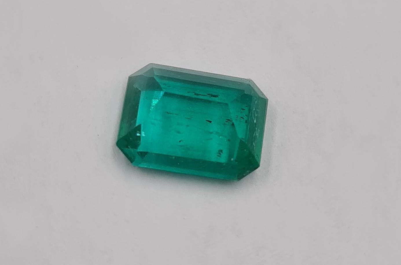 2 carat green emerald ring