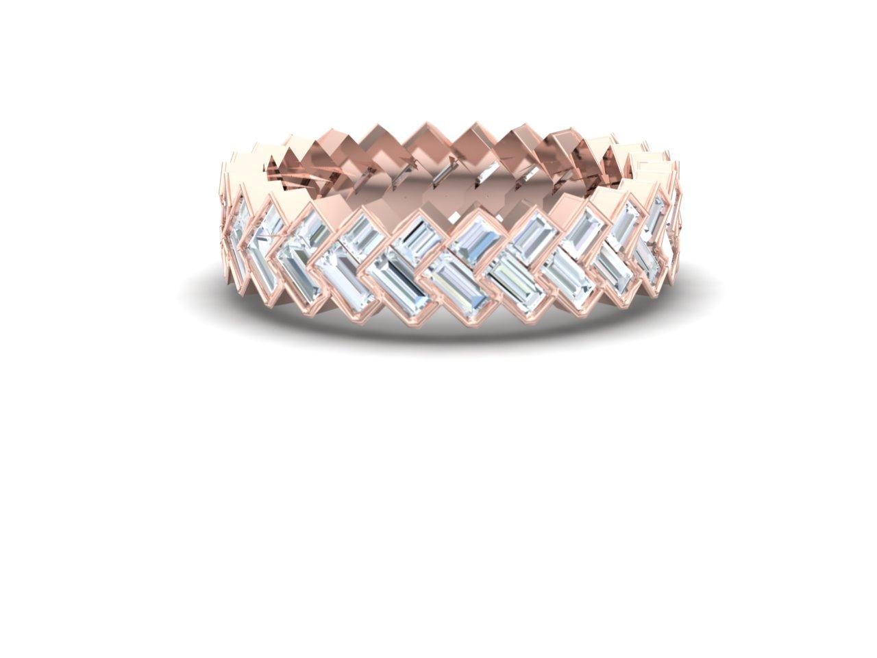 A gorgeous herringbone design diamond band is a perfect accent band to any diamond engagement ring or stacker band.  This stunning stacked chevron looks gives the wearer a taste of diamond and negative space maing it perfect to pair with any diamond