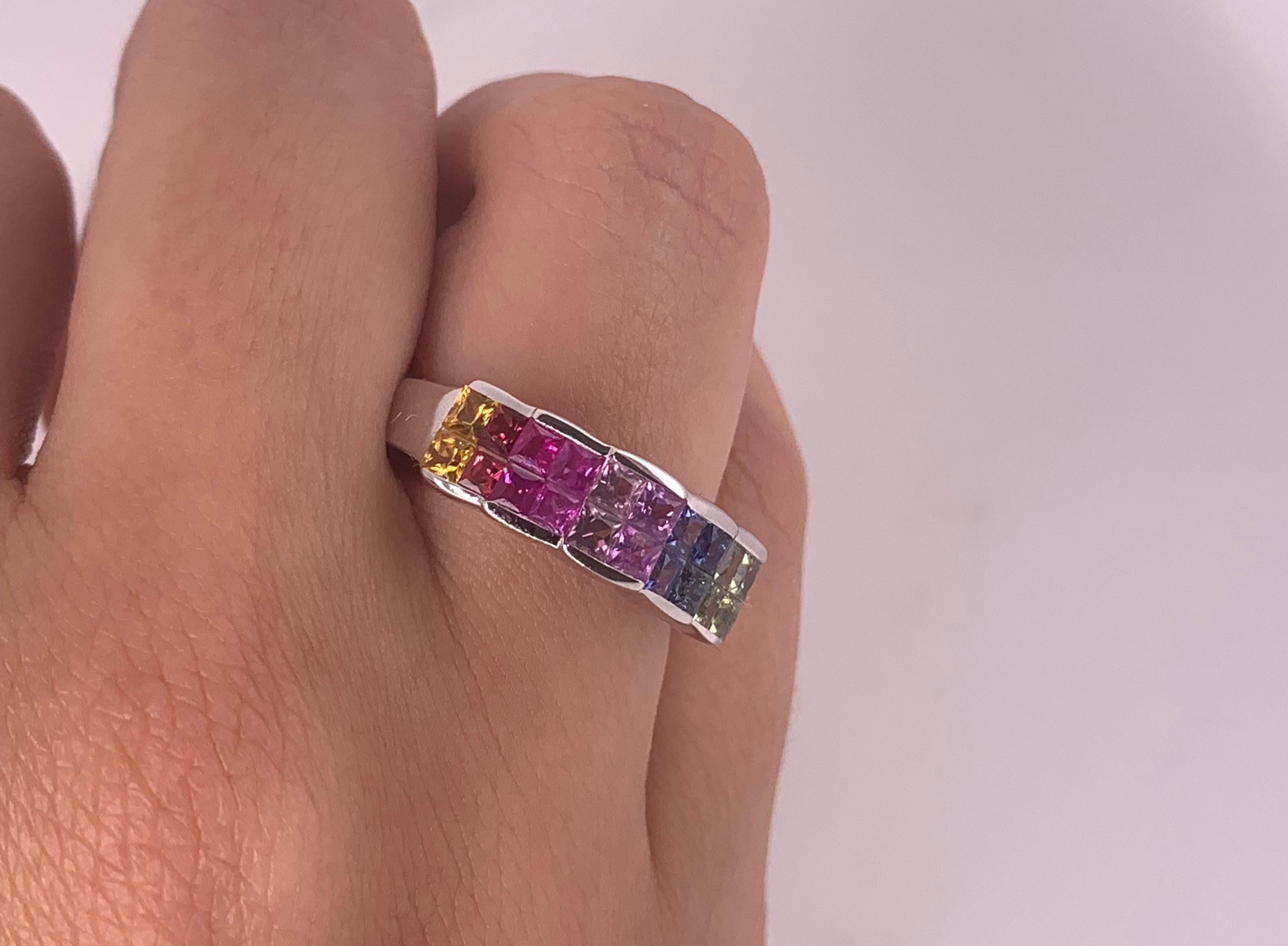 Material: 14k White Gold 
Stone Details:  20 Princess Cut Multicolor Sapphires - at 2 Carats - Blue, Pink, Red, Green, Yellow

Alberto offers complimentary sizing on all rings.

Fine one-of-a-kind craftsmanship meets incredible quality in this