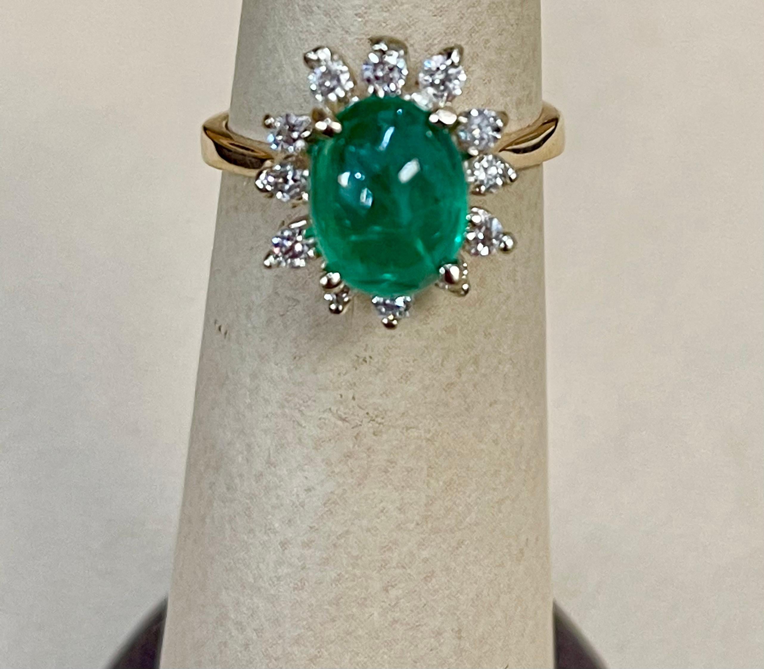 A classic, Cocktail ring 
I am selling this ring at a very reasonable price.
Approximately  2 Carat Natural Cushion Cabochon Emerald & Diamond Ring 14 Karat Yellow Gold size 5
Intense green color, Beautiful stone with shine and luster  and  has very