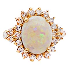 Vintage 2 Carat Opal and Diamond Halo Ring 14 Karat Yellow Gold