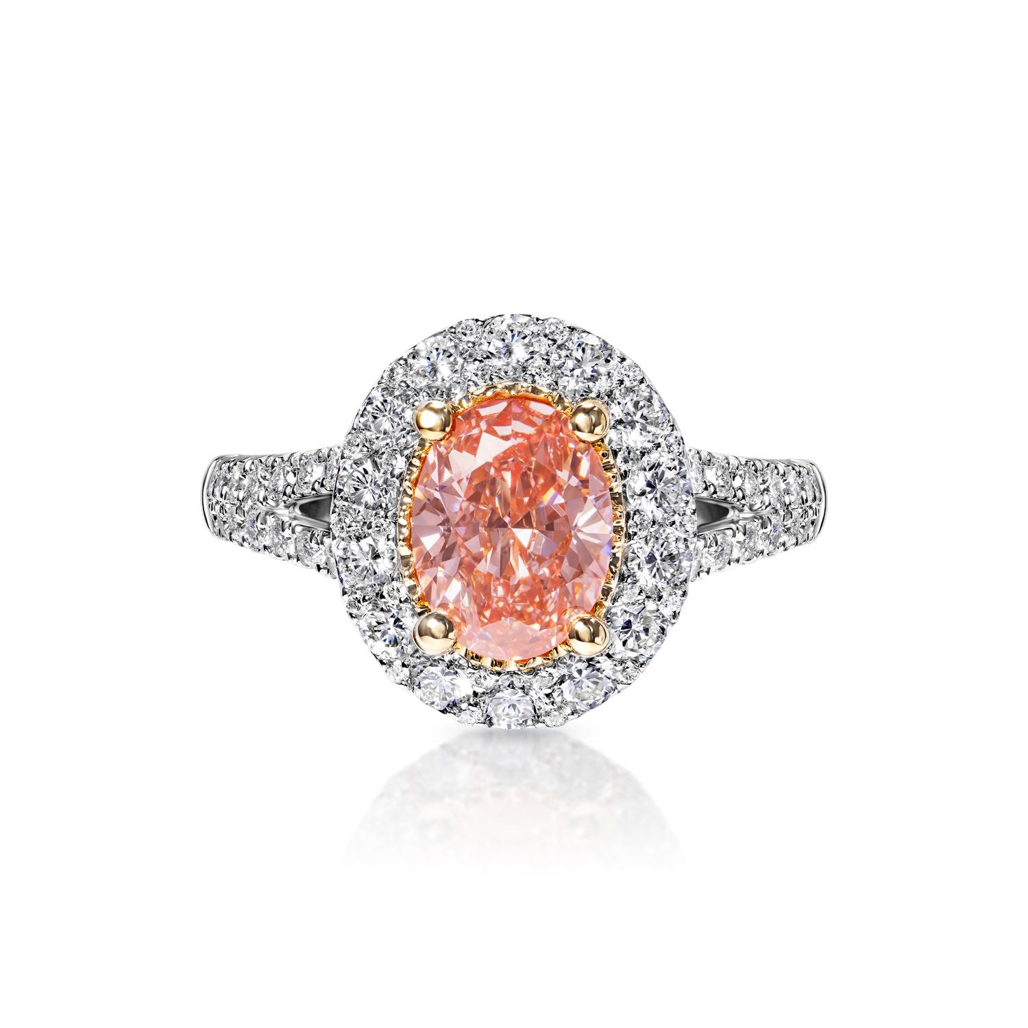 GIA Certified

Earth Mined Center Diamond:
Carat Weight: 1.20 Carat
Color: Fancy Vivid Pink*
Clarity: VS1
Style: Oval Cut

*This Diamond has been treated by one or more processes to change its color

Carat Weight: 0.87 Carat
Shape: Round Brilliant