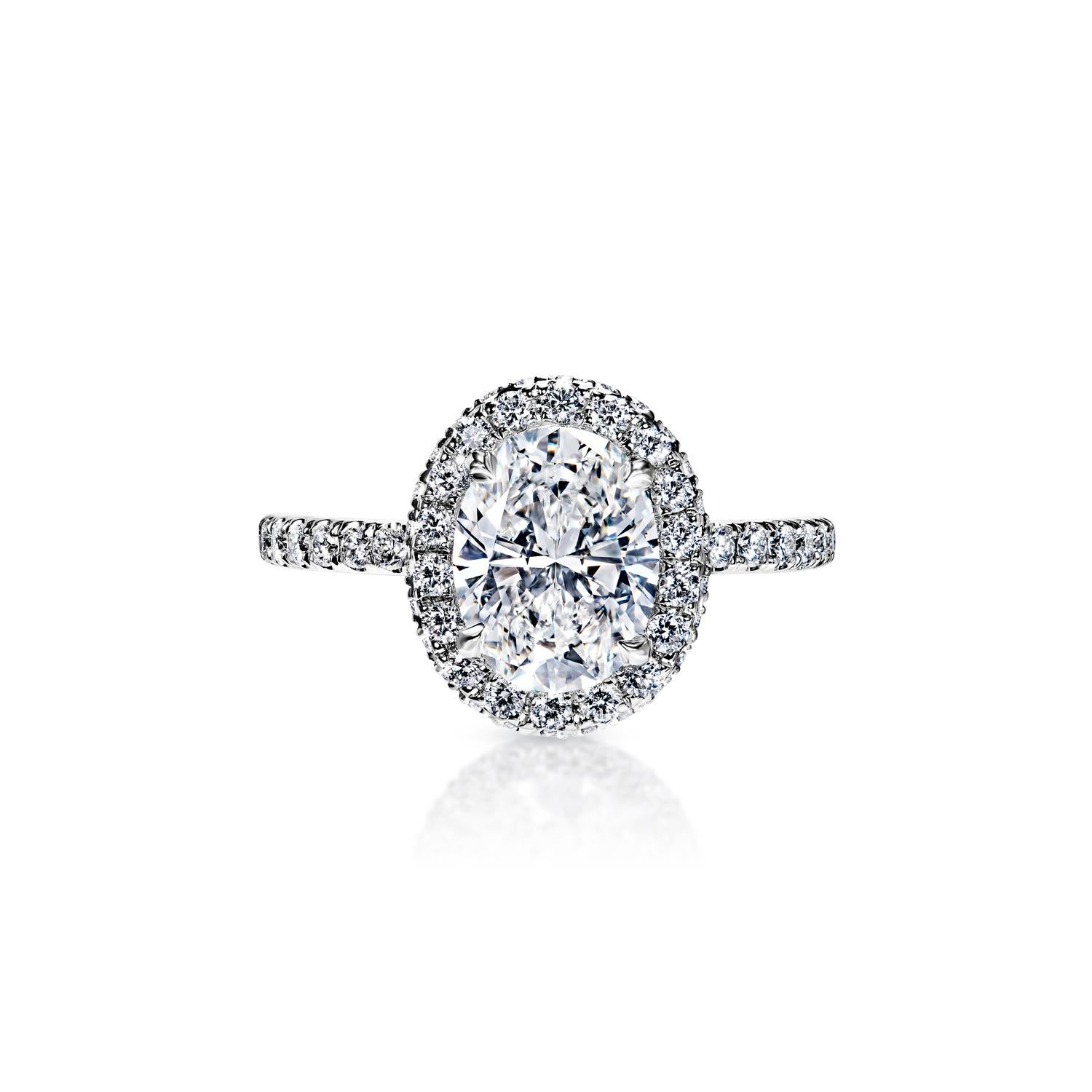 Adriana 2 Carat E SI1 Oval Cut Diamond Engagement Ring in 18k White Gold By Mike Nekta 

 


Center Diamond:

Carat Weight: 1.55 Carat
Color : E
Clarity: SI1
Style: Oval Cut

Ring:
Settings: Halo, Sidestone, French V Split, 4 Petite Claw