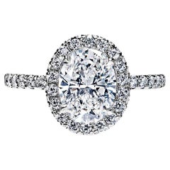 2 Carat Oval Cut Diamond Engagement Ring in 18k White Gold E SI1