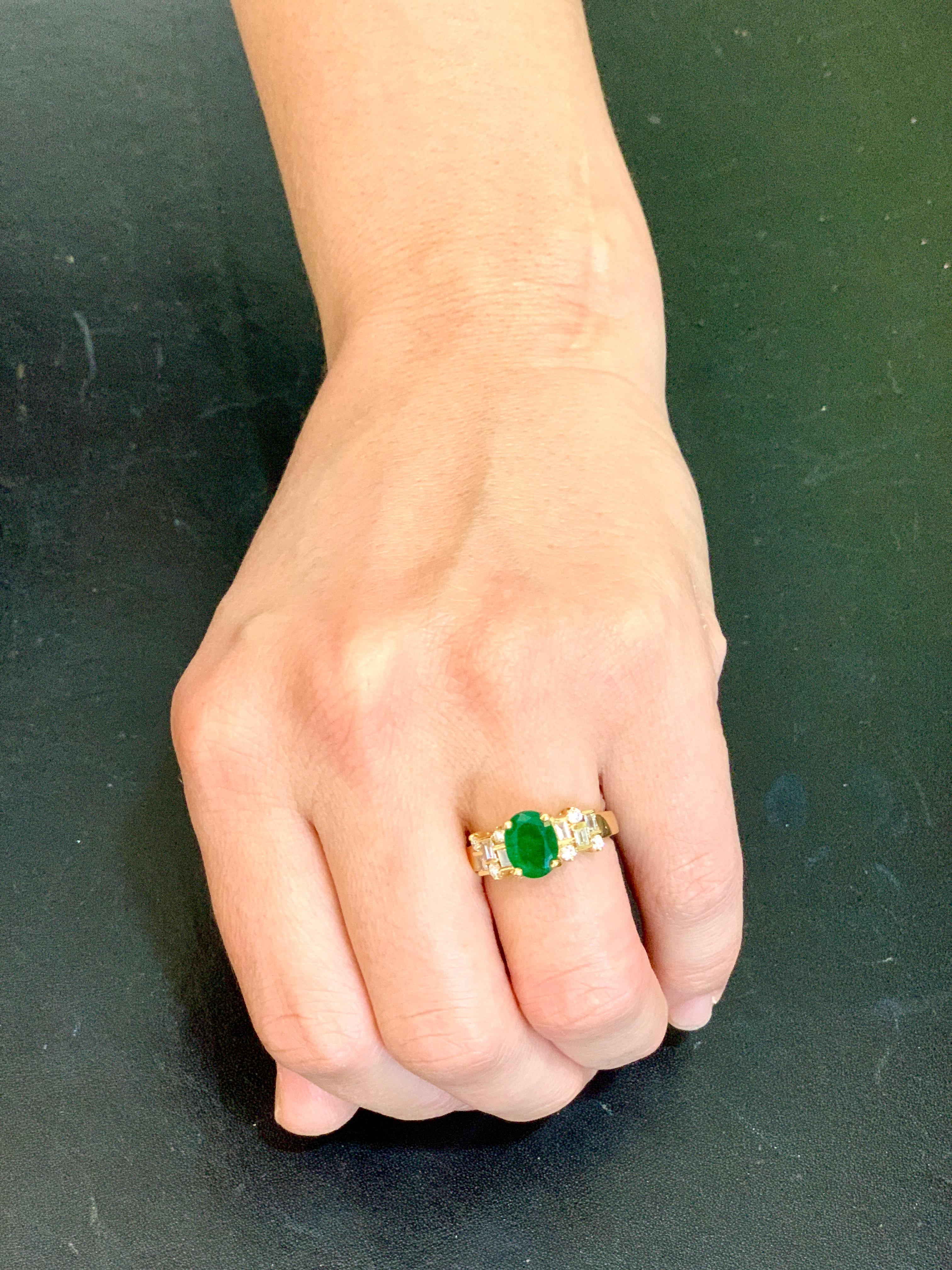 2 Carat Oval Cut Emerald and 0.5 Carat Diamond Ring 18 Karat Yellow Gold In Excellent Condition For Sale In New York, NY