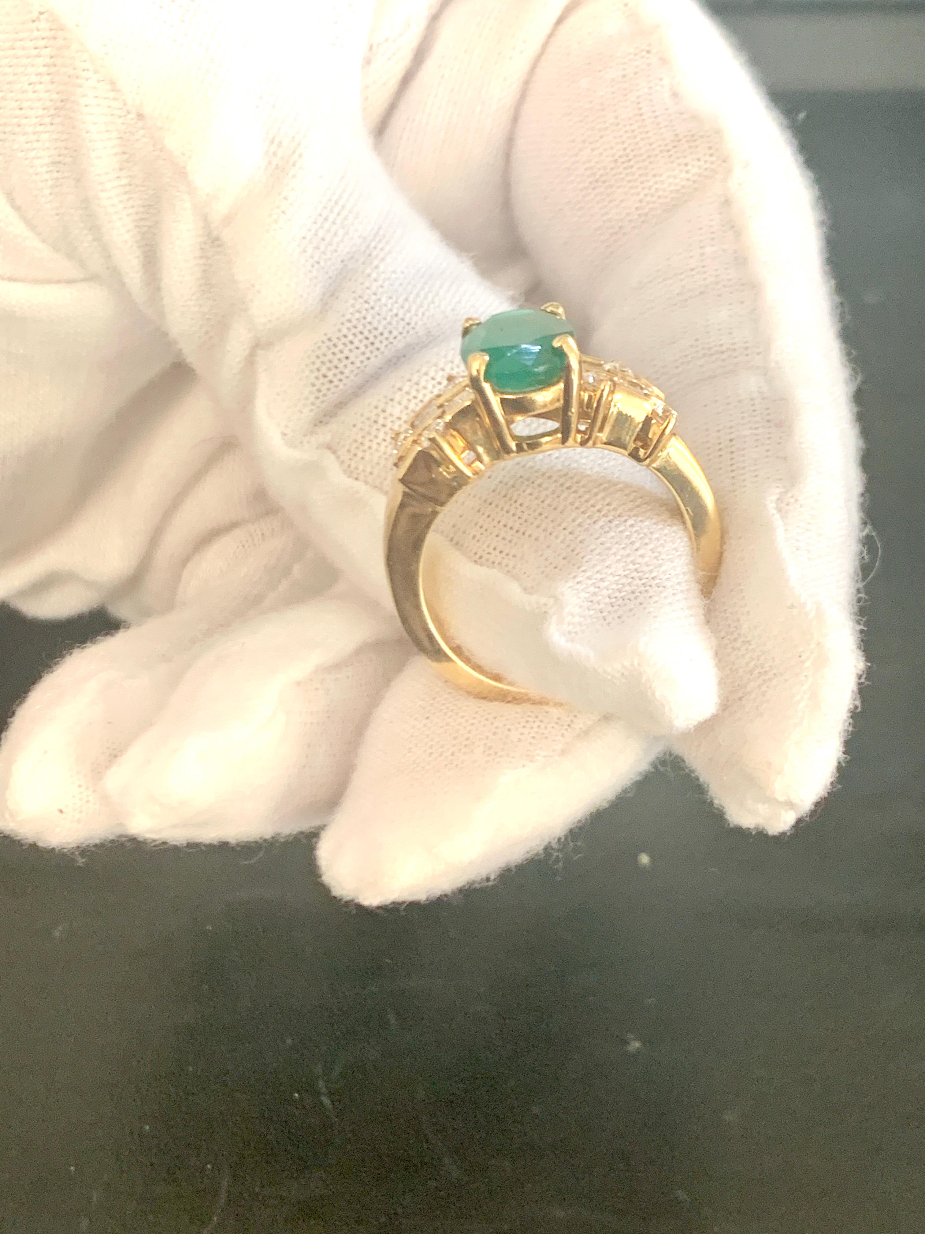 2 Carat Oval Cut Emerald and 0.5 Carat Diamond Ring 18 Karat Yellow Gold For Sale 2