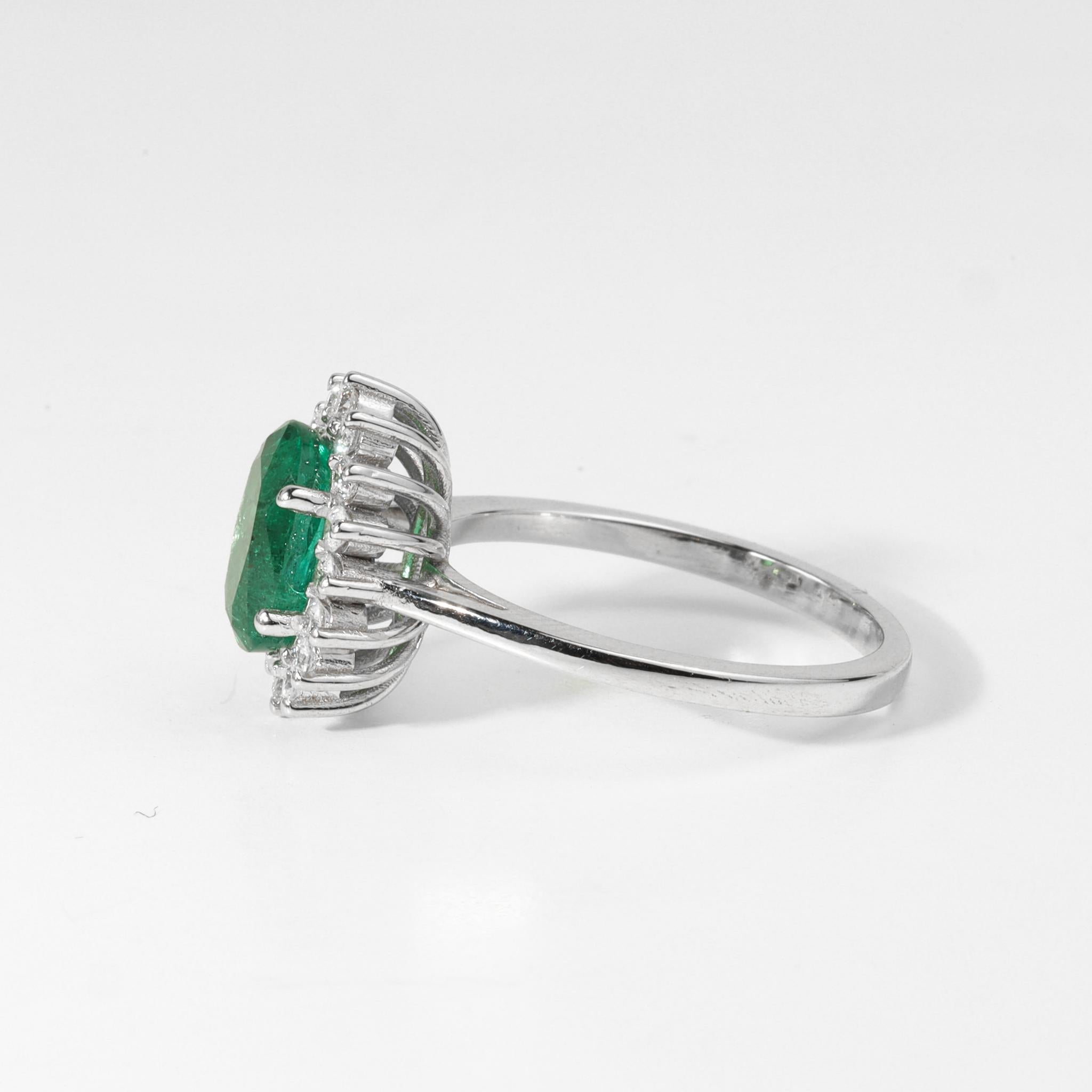 2 Carat Oval Cut Emerald And Diamond Halo Engagement Ring In 18k White Gold In New Condition For Sale In Jaipur, RJ