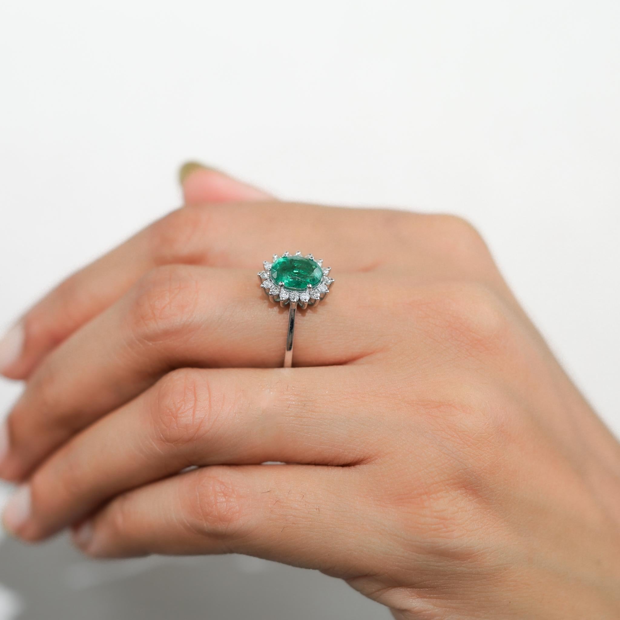 2 Carat Oval Cut Emerald And Diamond Halo Engagement Ring In 18k White Gold For Sale 2