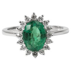 2 Carat Oval Cut Emerald And Diamond Halo Engagement Ring In 18k White Gold