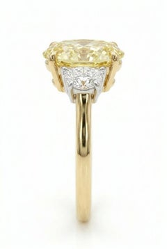 GIA Certifiied 2.07 Carat Oval Cut Fancy Yellow VVS1 Clarity Diamond Ring