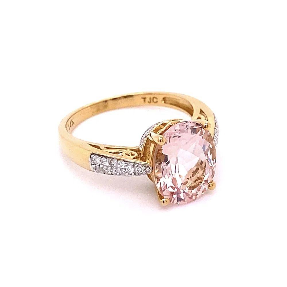 Simply Beautiful! Finely detailed Oval Kunzite and Diamond Gold Vintage Solitaire Ring. Featuring a securely Hand set 2 Carat Oval Kunzite. Beautifully accented with Sparkling Diamonds, weighing approx. 0.20tcw. Hand crafted 14K Yellow Gold