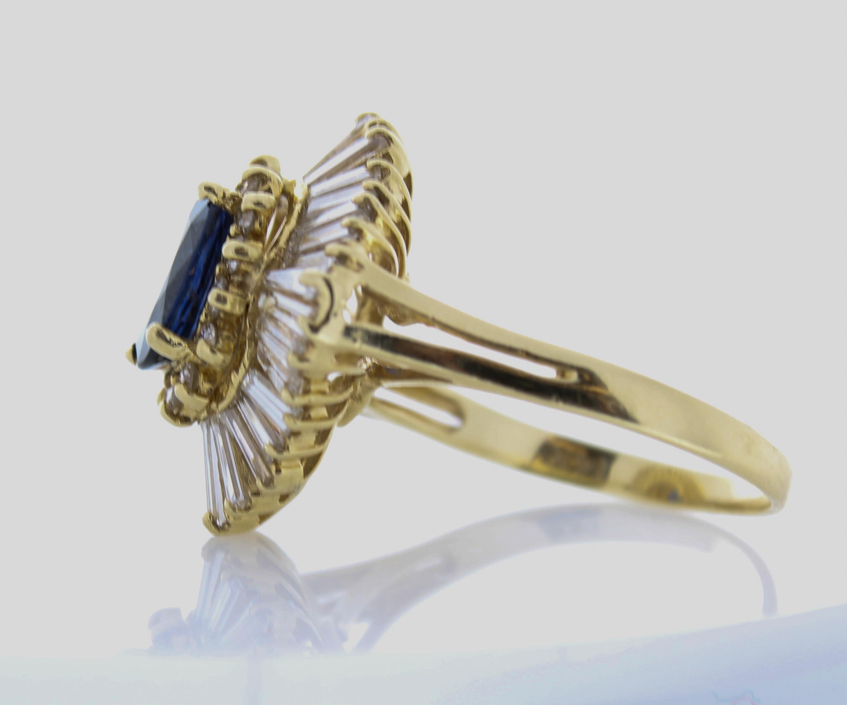 Contemporary 2 Carat Oval Sapphire & Diamond Ring in 14k Yellow Gold