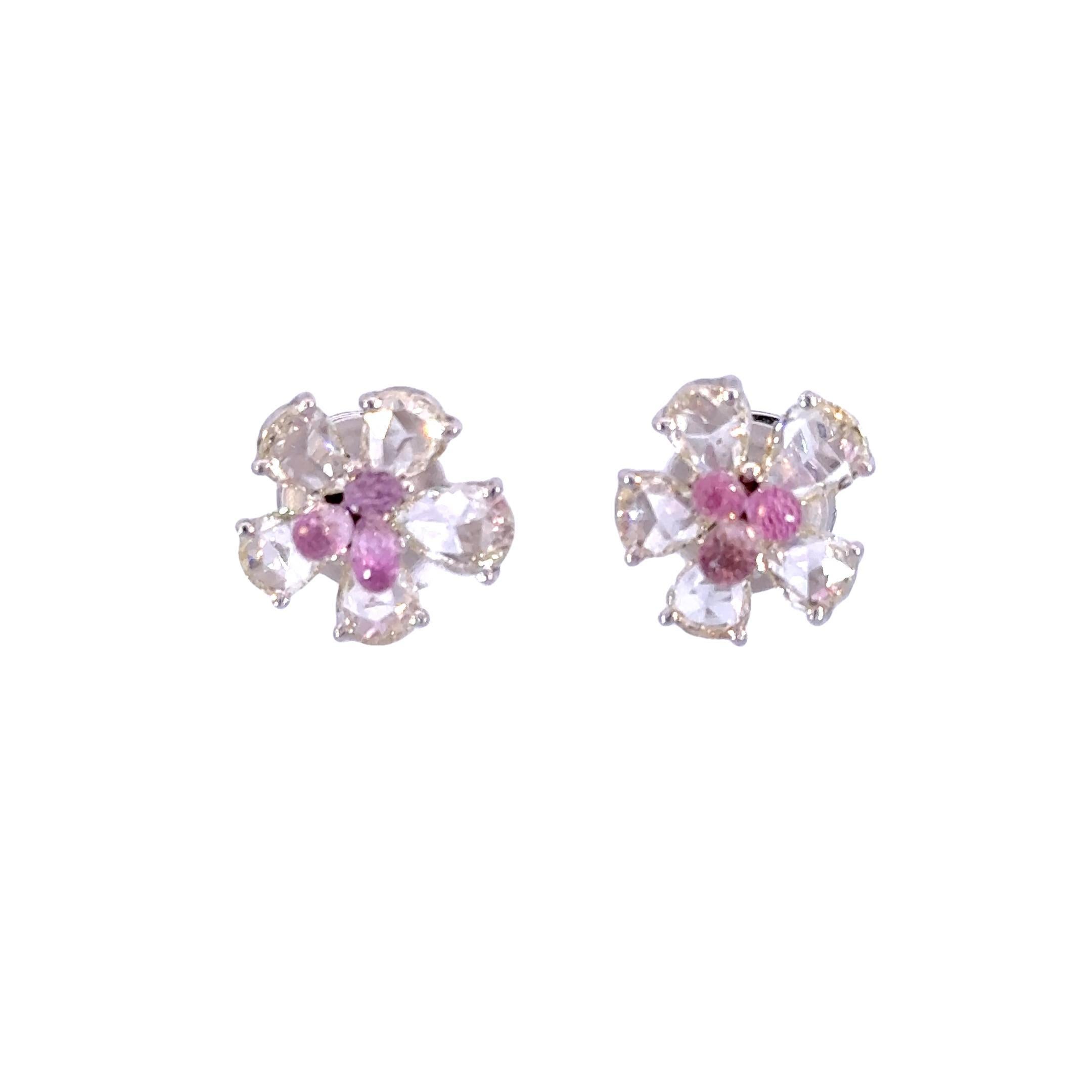 Introducing our Tourmaline Rosecut Studs—a delicate and enchanting pair that marries the timeless brilliance of diamonds with the captivating allure of pink tourmalines. These exquisite studs feature 2.38 carats of diamonds and 2 carats of pink