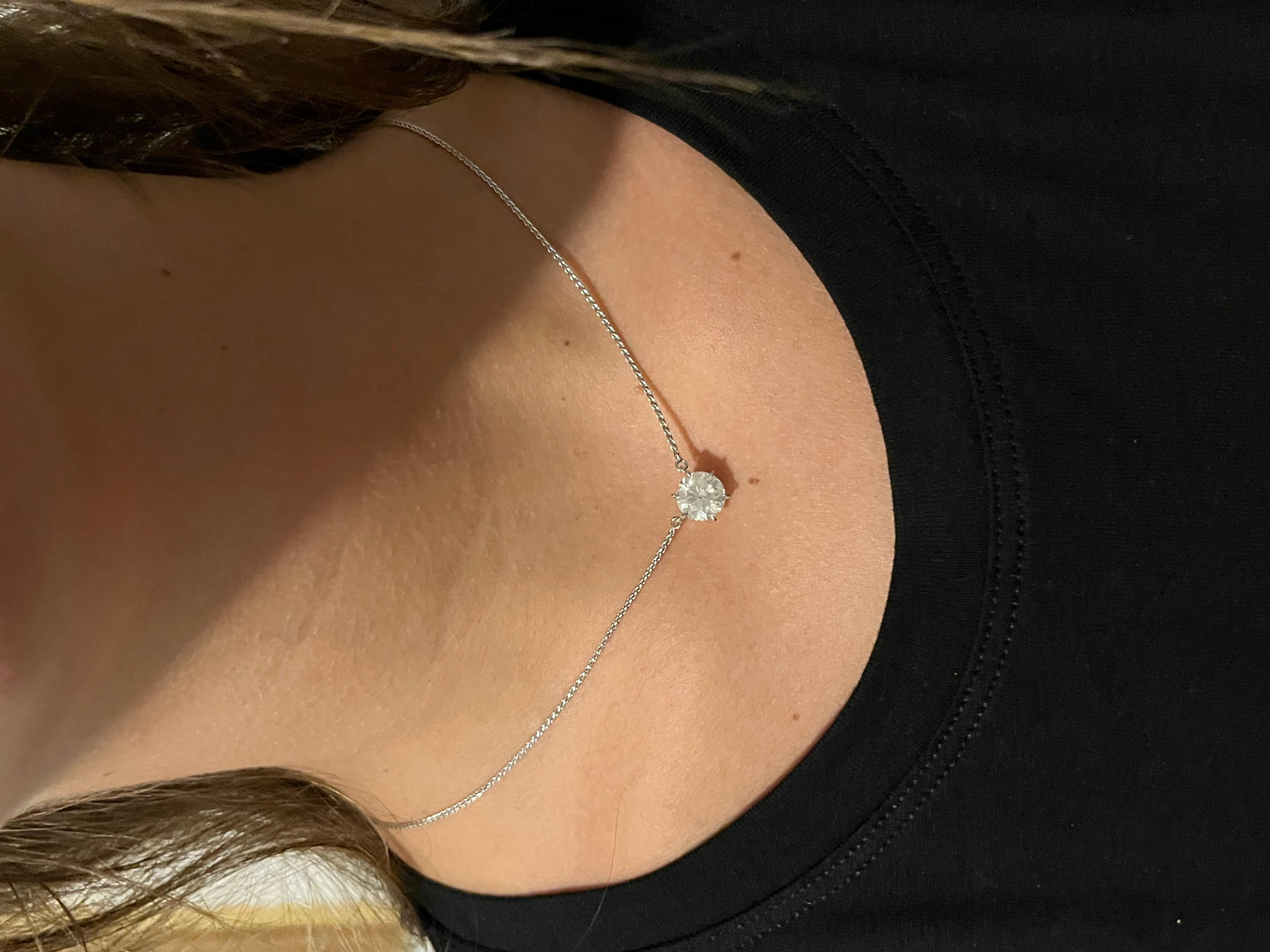 2.29 carat natural round cut diamond set in a 6 prong 14k white gold integral setting. The setting is seamlessly integrated with a 14k solid white gold cable chain of 2mm and 16 inches. A classic and timeless piece ideal for everyday wear. 
 
✔ Gold