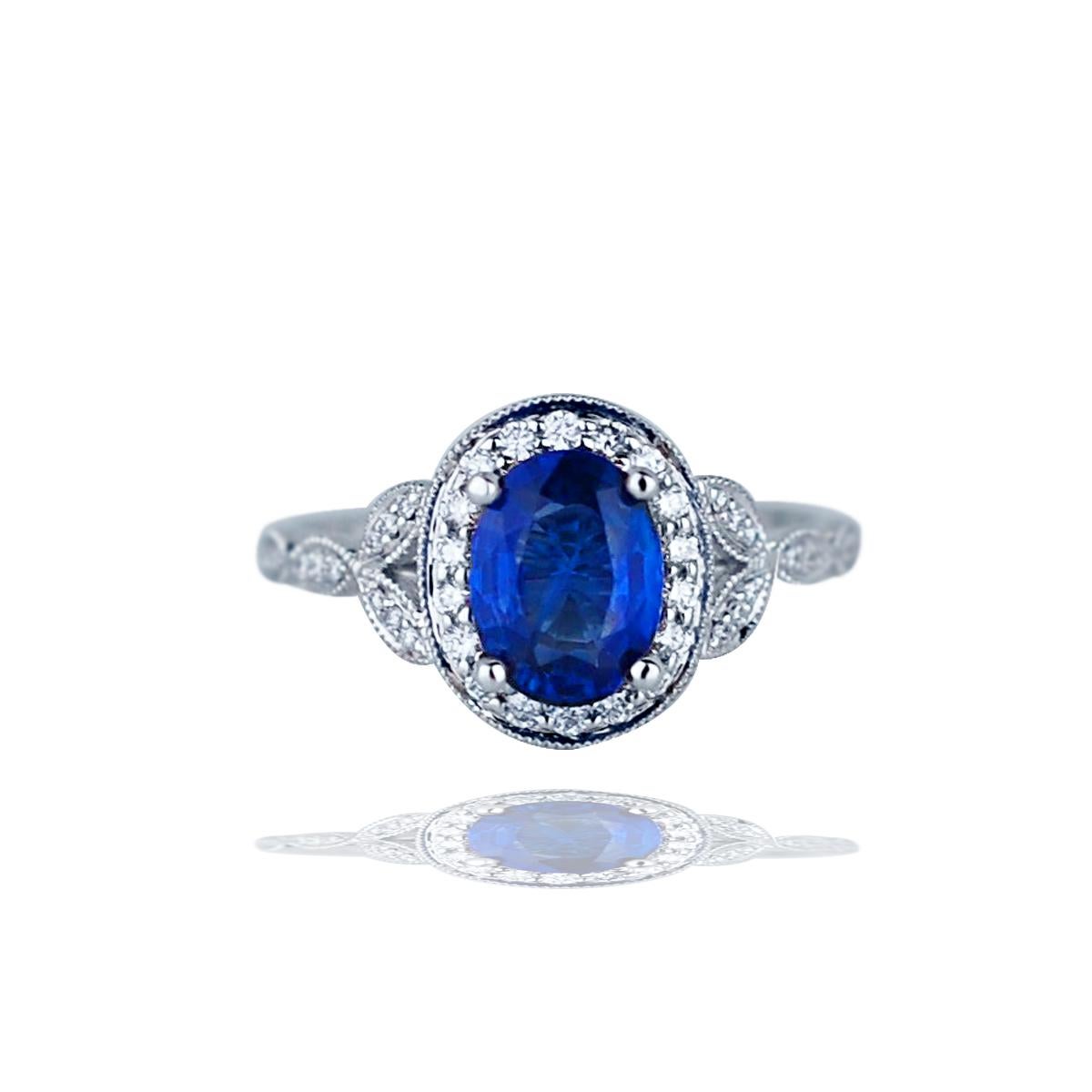 Oval Cut 2 Carat Sapphire and Diamond Ring For Sale