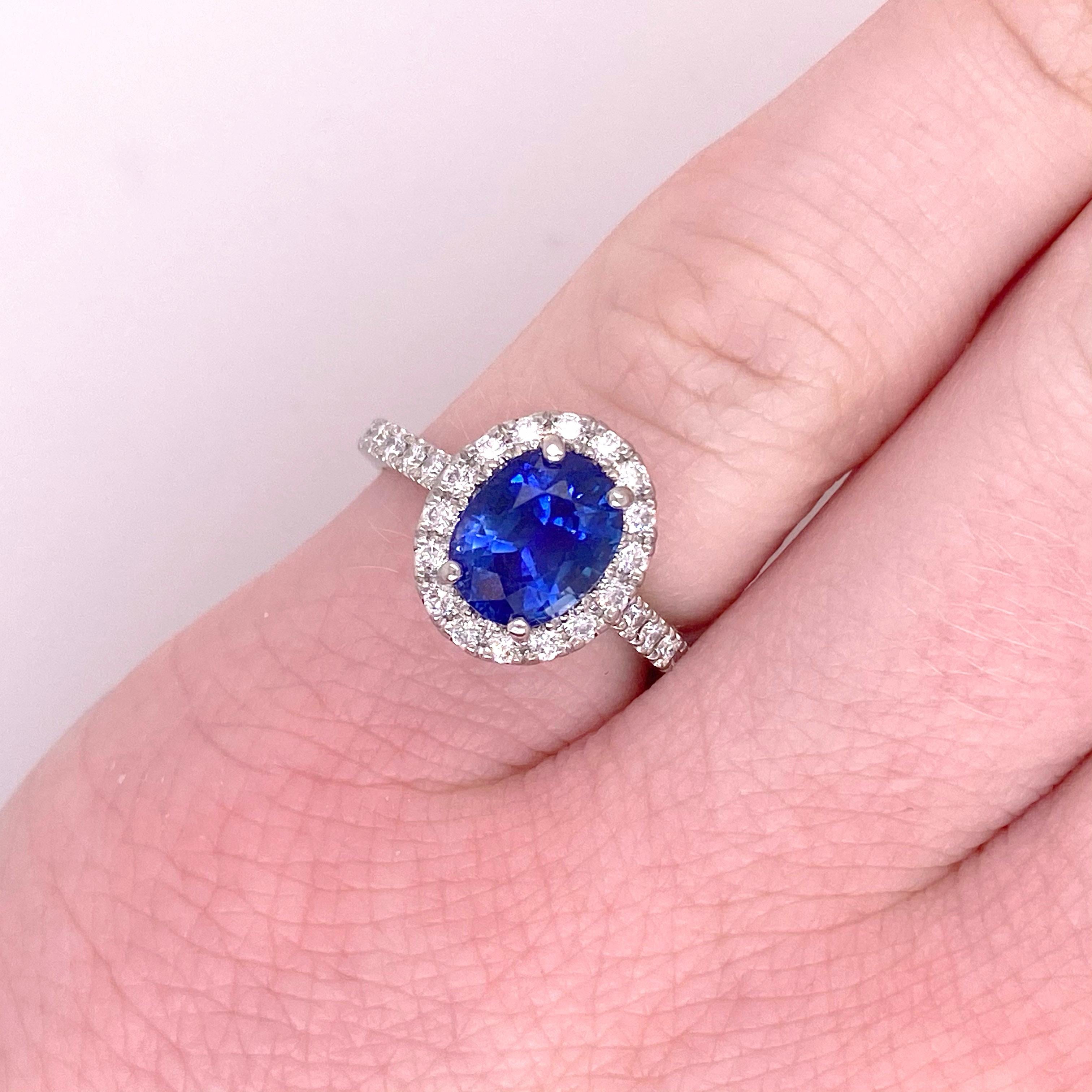 Ceylon Sapphire and Diamond halo Engagement Ring. This ring is made for a queen! The blue sapphire gemstone was originally the choice of center stone for royalty, especially in engagement rings. Today they are still used as the center stone! 
This