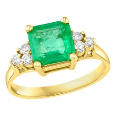 2 Carat Square Cut Emerald and 0.25 Carat Diamond Ring 14 Karat Yellow Gold