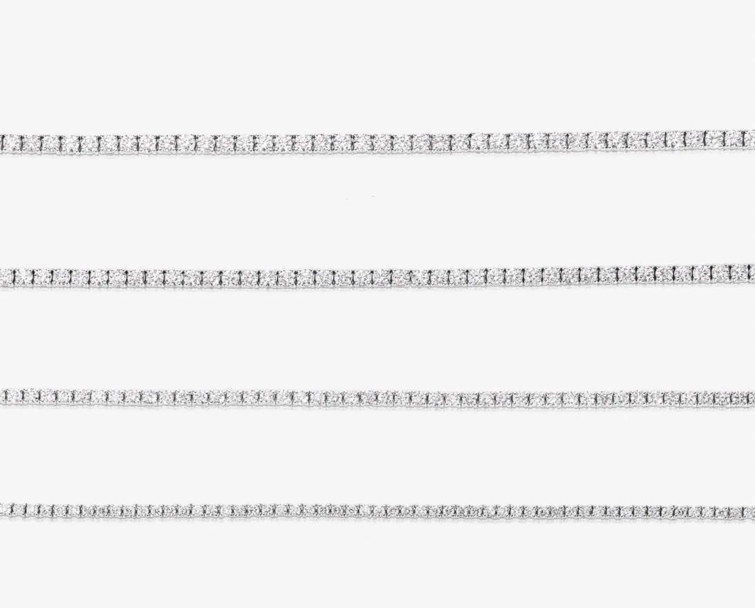 A timeless staple in any fine jewelry collection, this classic diamond tennis bracelet delivers refined sparkle and everyday elegance. Set in polished 14K white gold, the bracelet features a seamless line of natural round brilliant diamonds totaling