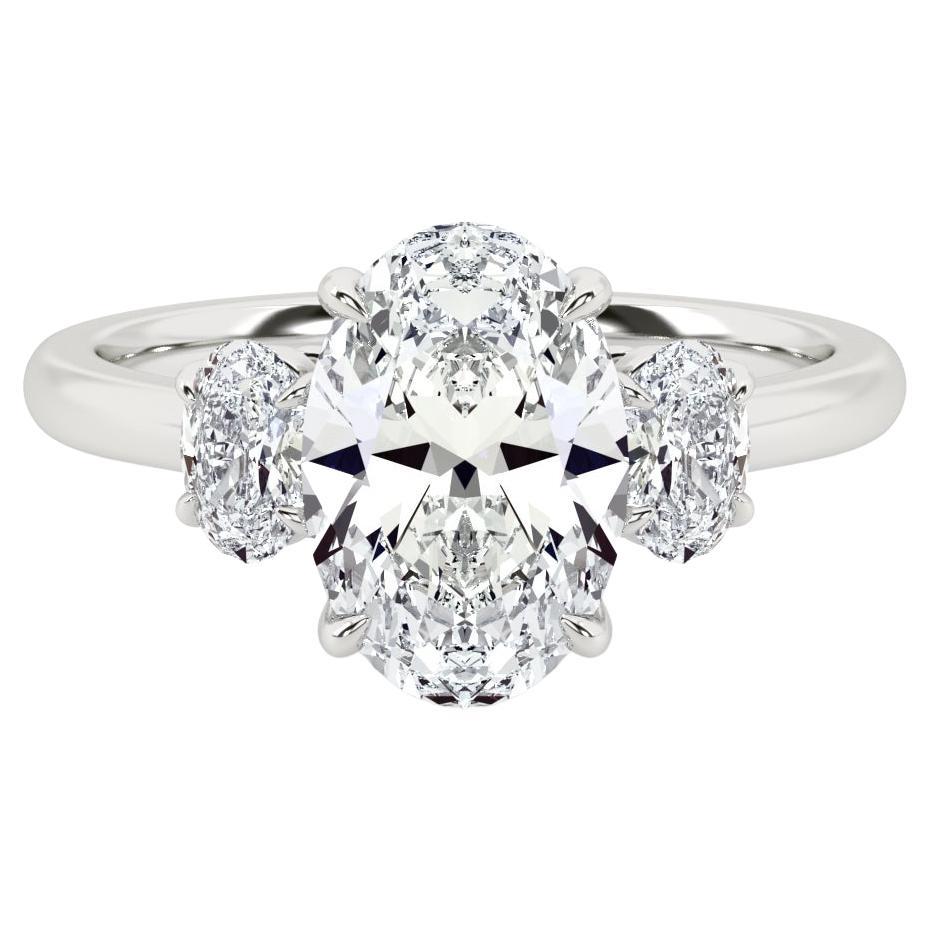 2 Carat Three-Stone Oval Diamond Engagement Ring in Platinum For Sale