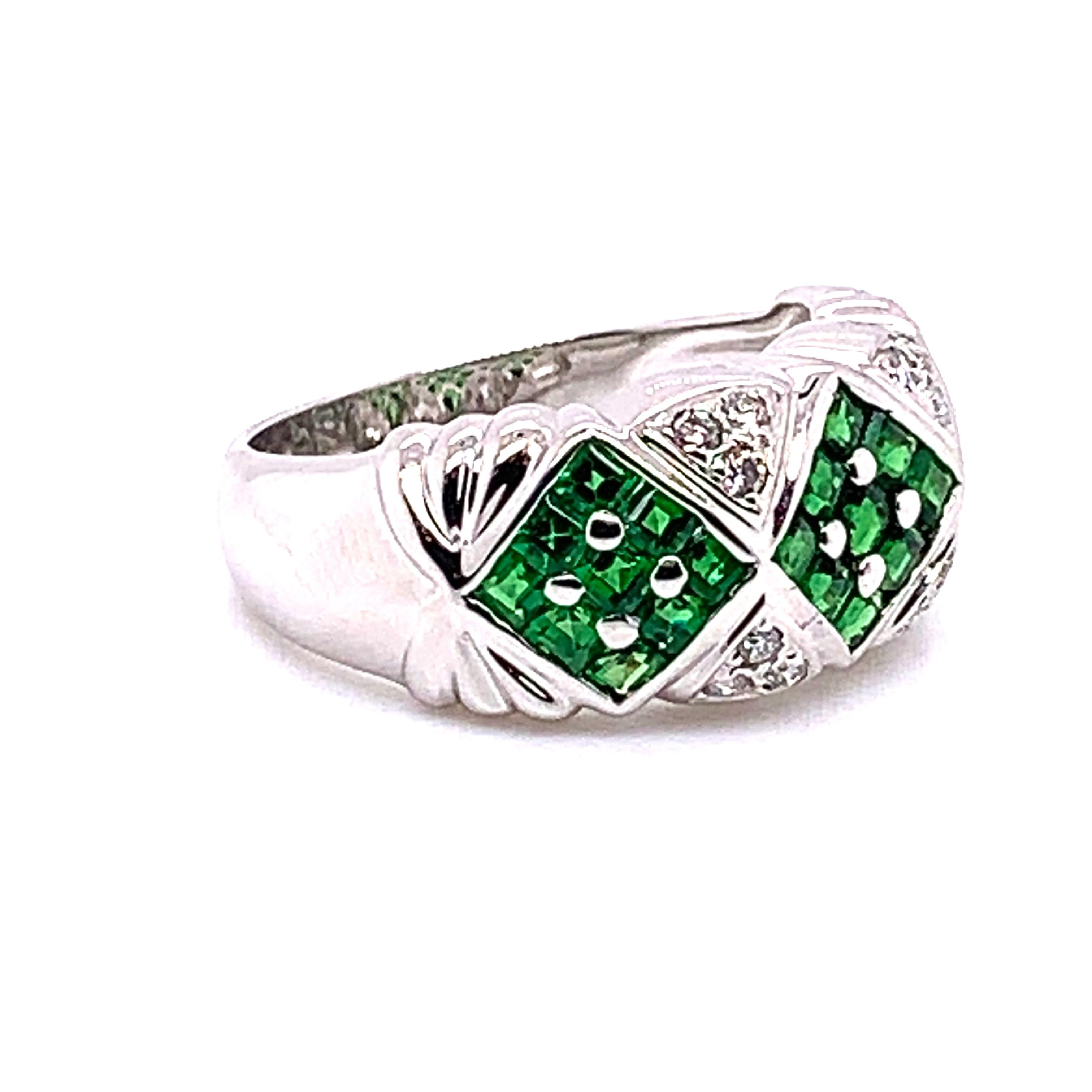 Feast your eyes on this Elegant 2 Carat Fashion verdant green Tsavorite and Diamond Ring made by Shimon's Creations. This Magnificent Ring in 18 Karat white gold features 0.16 Carat White Diamonds 1.84 Carat Green Tsavorite.  

Color Stone, Diamond,