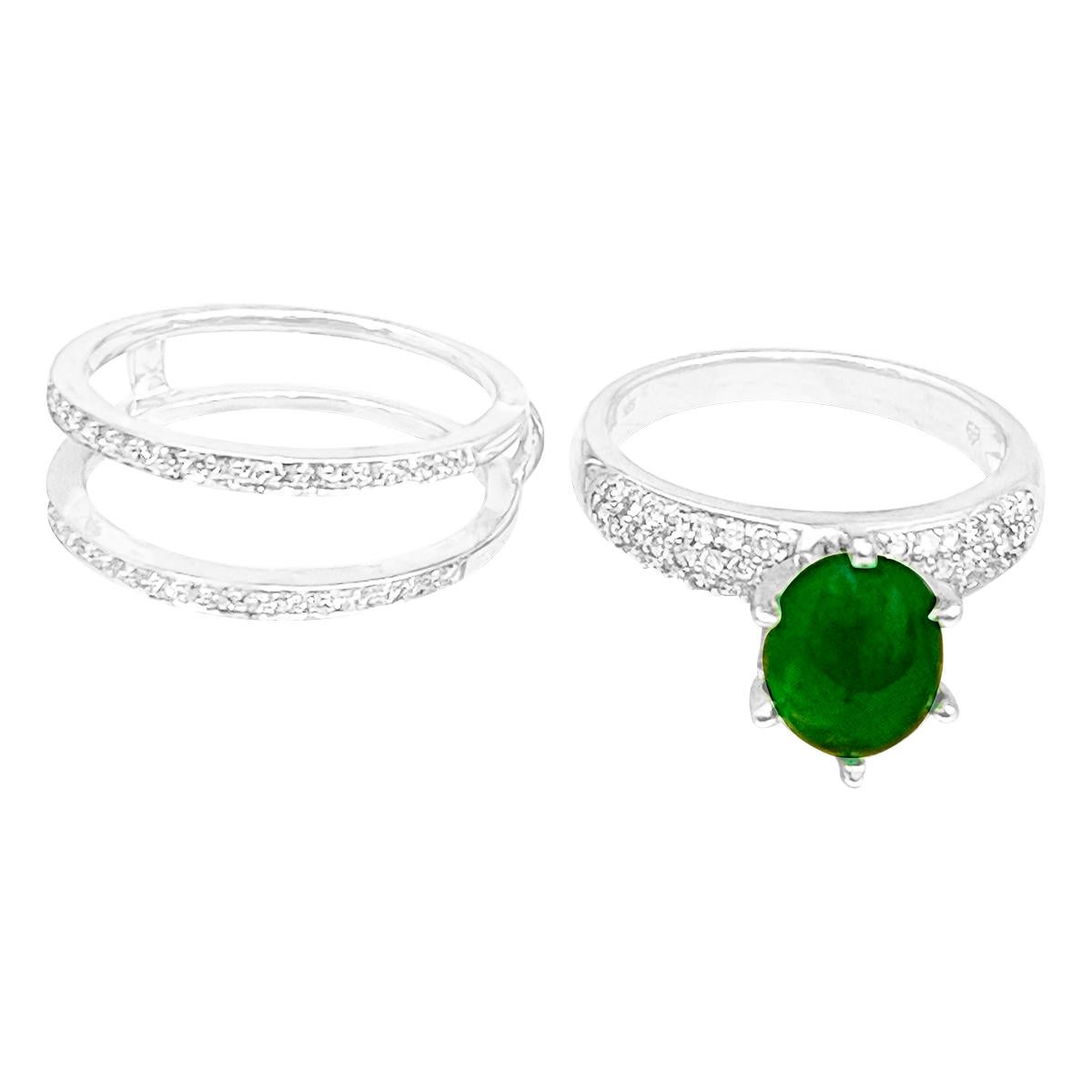 A classic, Cocktail ring 
2 Carat Zambian Emerald Cabochon & Diamond Cocktail  Ring 14 Karat White Gold with diamond band  , Estate with no color enhancement. 
Gold: 14 Karat  White  gold ,
Weight: 7.2 gram with stone 
Diamond approximately 0.85