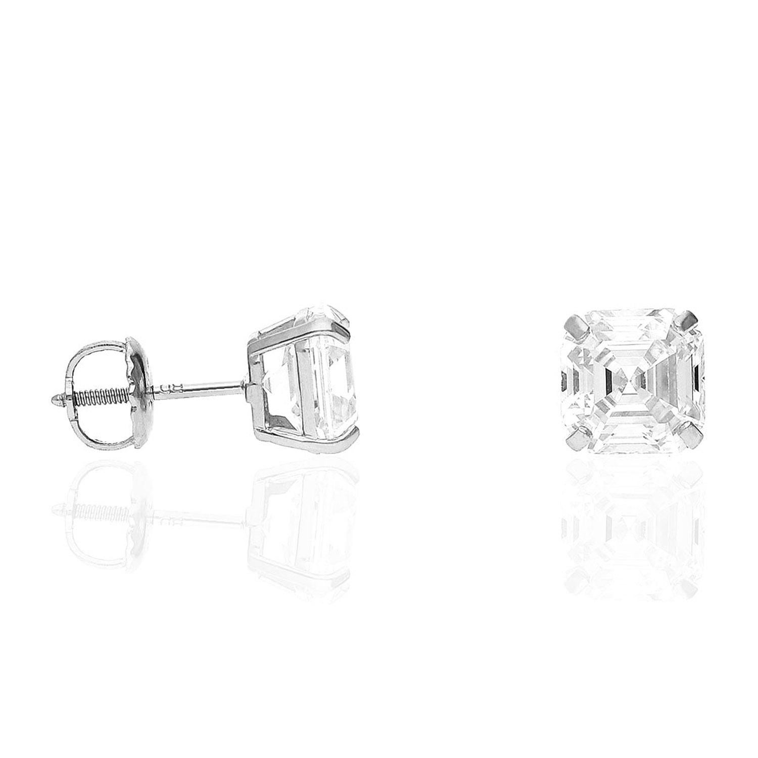  2.09ctw pair of asscher cut diamonds is gorgeously sophisticated and is exceptionally clean with VS1 clarity! The diamonds are graded J-K for color, and they face up with very minimal warmth. The very subtle hint of color is overwhelmed by the