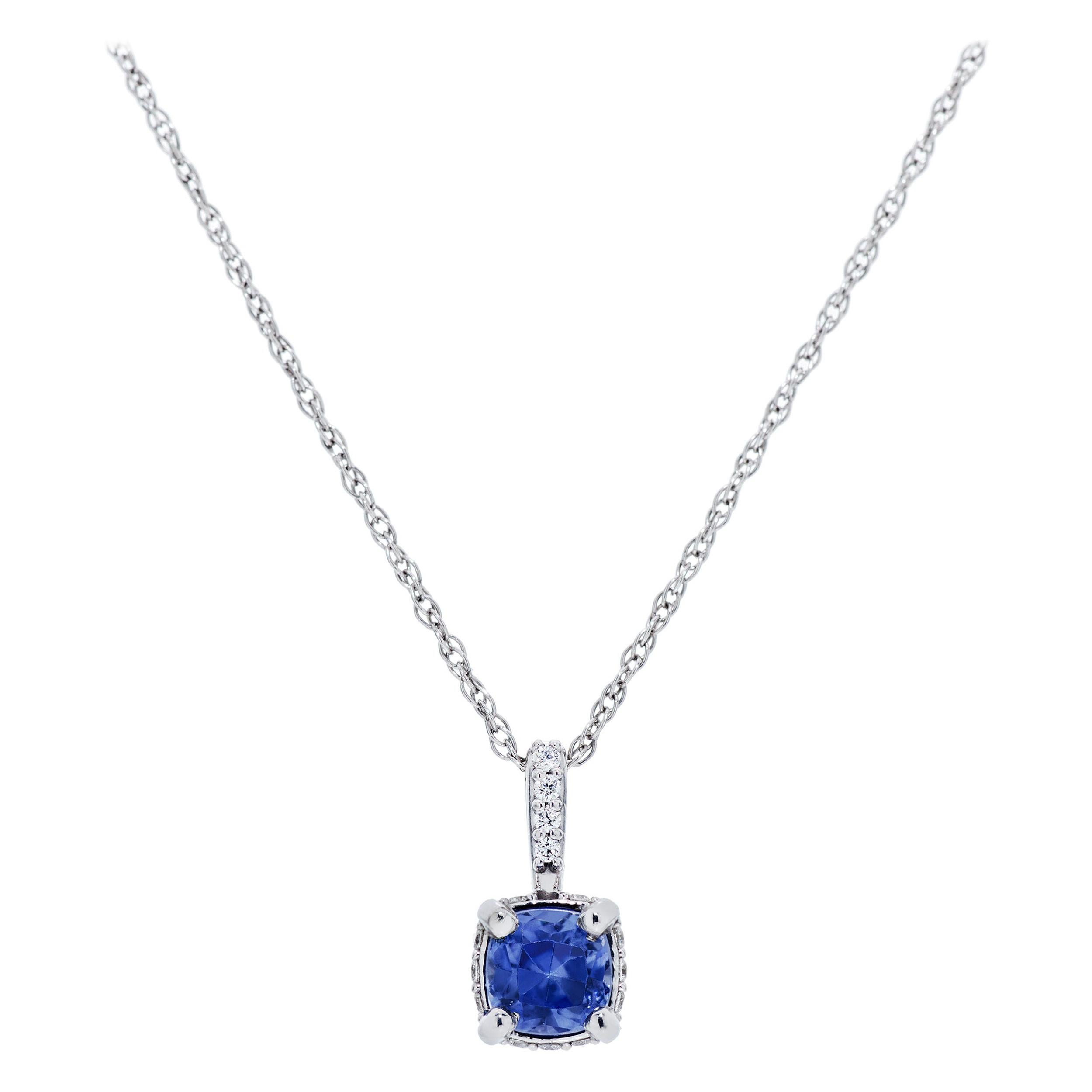 A clean and elegant matching necklace and earring set featuring a total of 2 Carats Cushion Cut Sapphires and Diamonds in the Necklace and Earring set created in 14K WG.  The pendant hangs on an 18