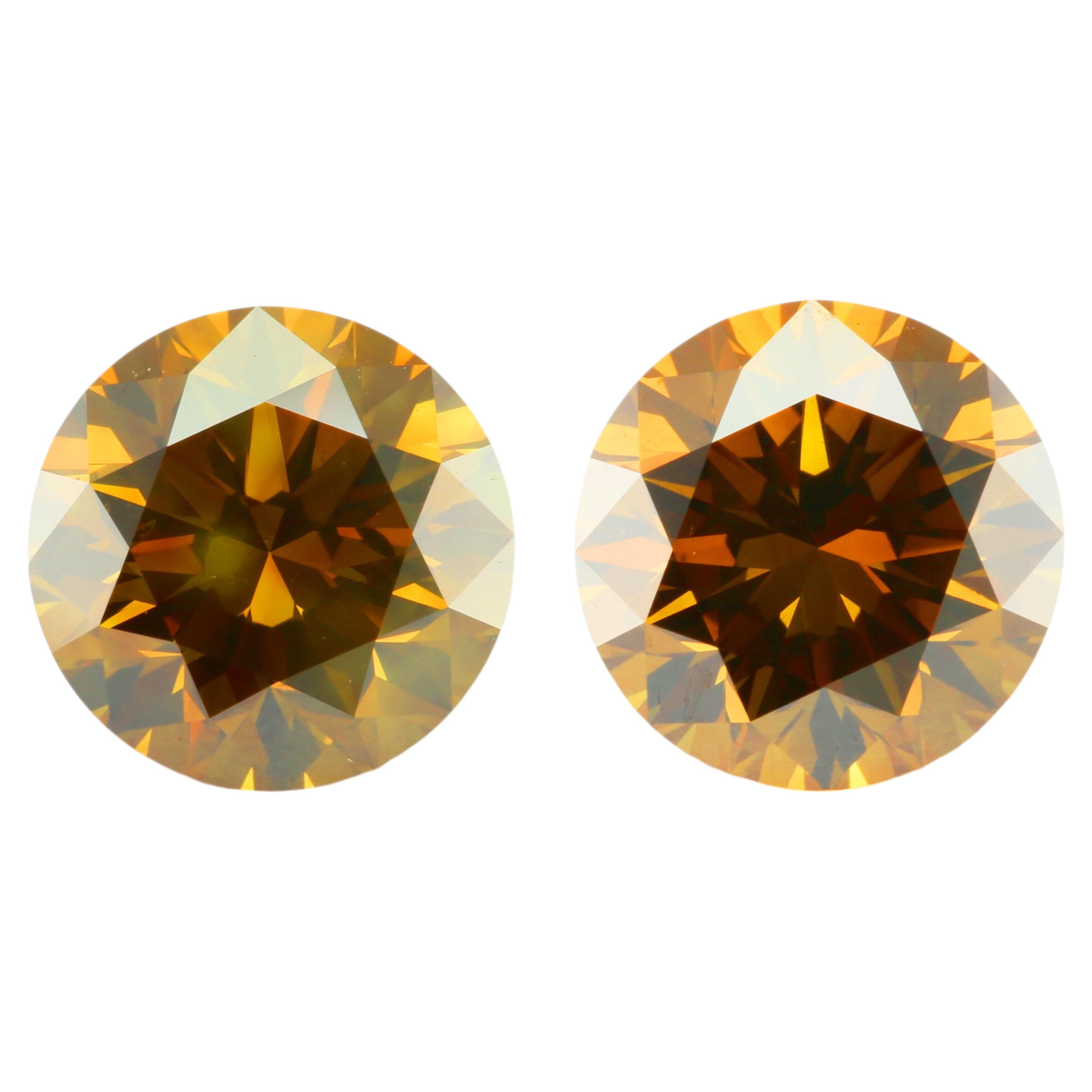 Coppia di diamanti da 2 carati  Brillanti rotondi di colore giallo-marrone intenso Vs2-Si2 GIA in vendita
