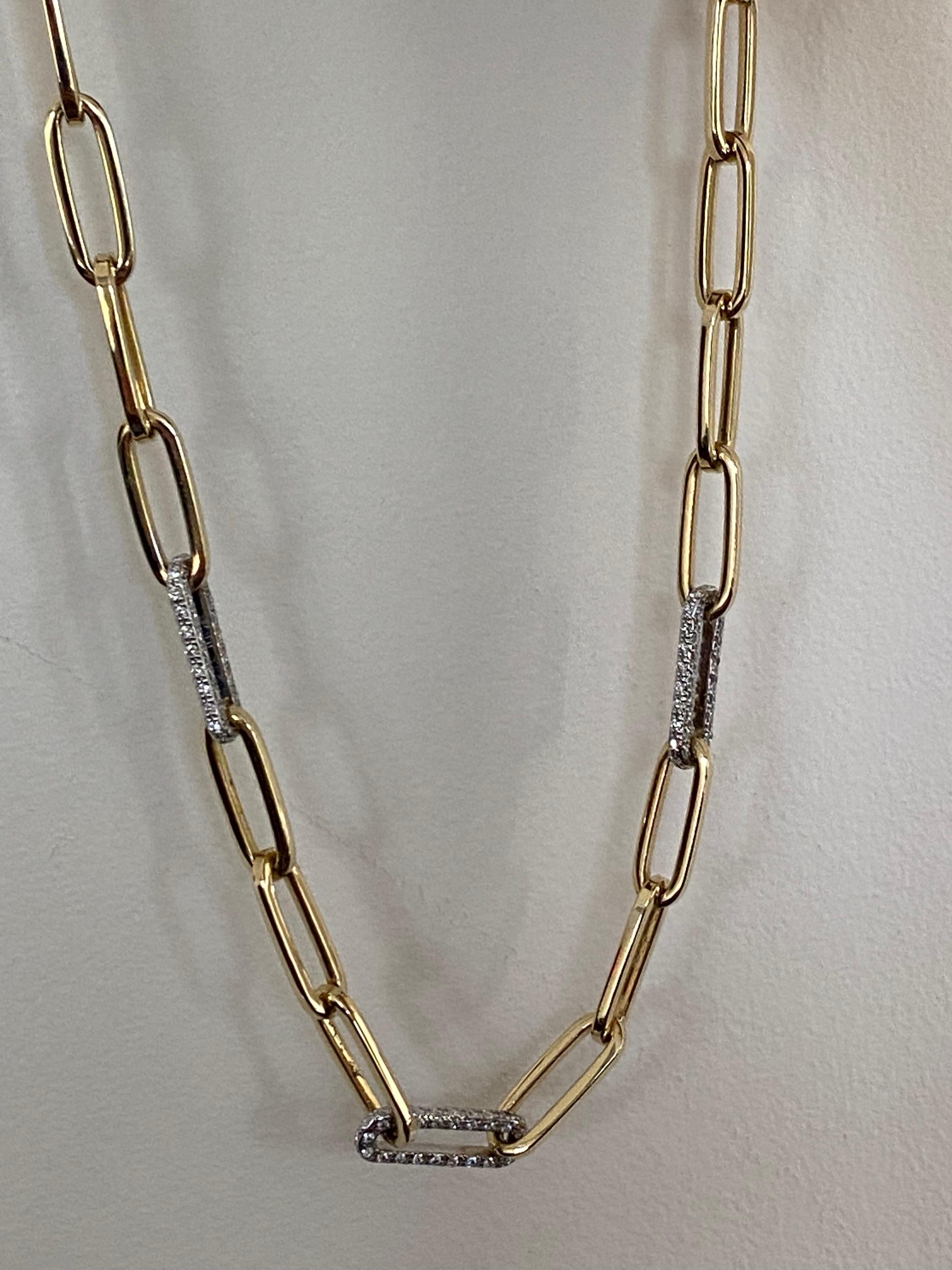Paperclip necklace set in 14K yellow gold. 3 sections of the diamonds set part in white gold. The carat weight of the piece is 2.09. The color of the stones are G, the clarity is SI1-SI2. The necklace is 16 inches.