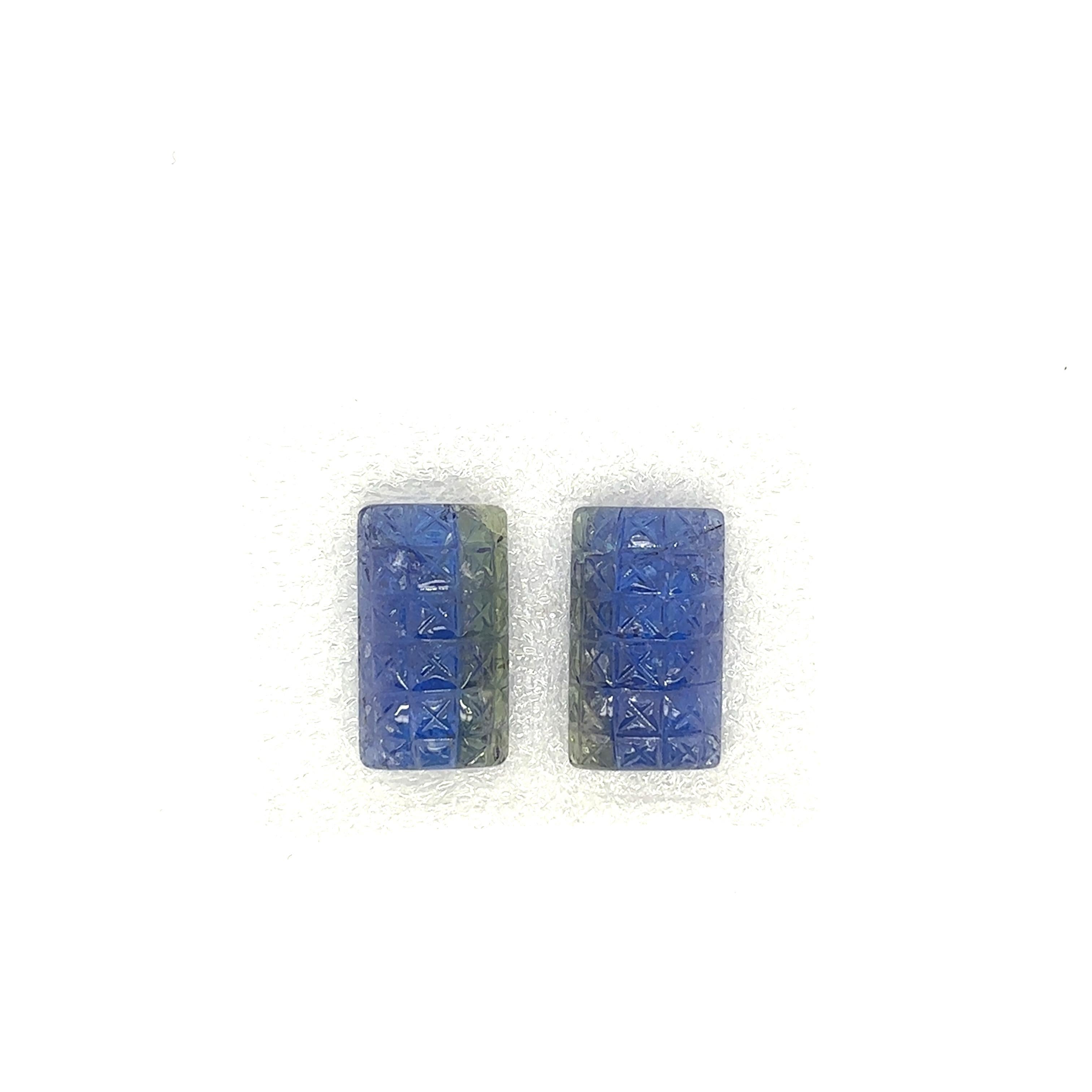 Queste due squisite pietre di tanzanite intagliate, per un totale di 29,05 carati, mostrano la bellezza unica di questa rara gemma. 

Estratta dall'unica fonte conosciuta in Tanzania, la tanzanite è nota per il suo sorprendente colore blu-violetto,