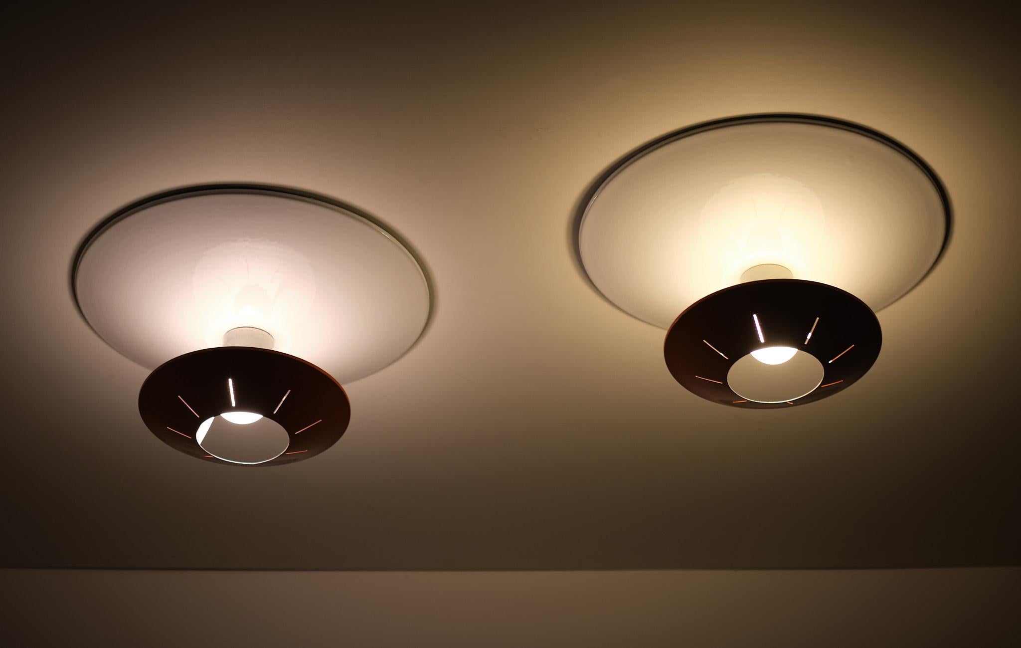 Émail 2 Plafonniers ou lampes murales Louis Kalff pour Philips, années 1960 en vente