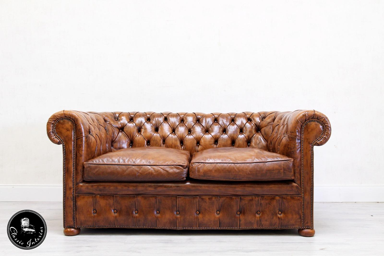 2 chesterfield real leather two-seat sofas in original design
Very comfortable and with beautiful patina
Condition: The sofas are in a very good condition
sofa
Measures: Height x 77cm, length x 170cm, depth x 90cm.
Cushion is in good condition