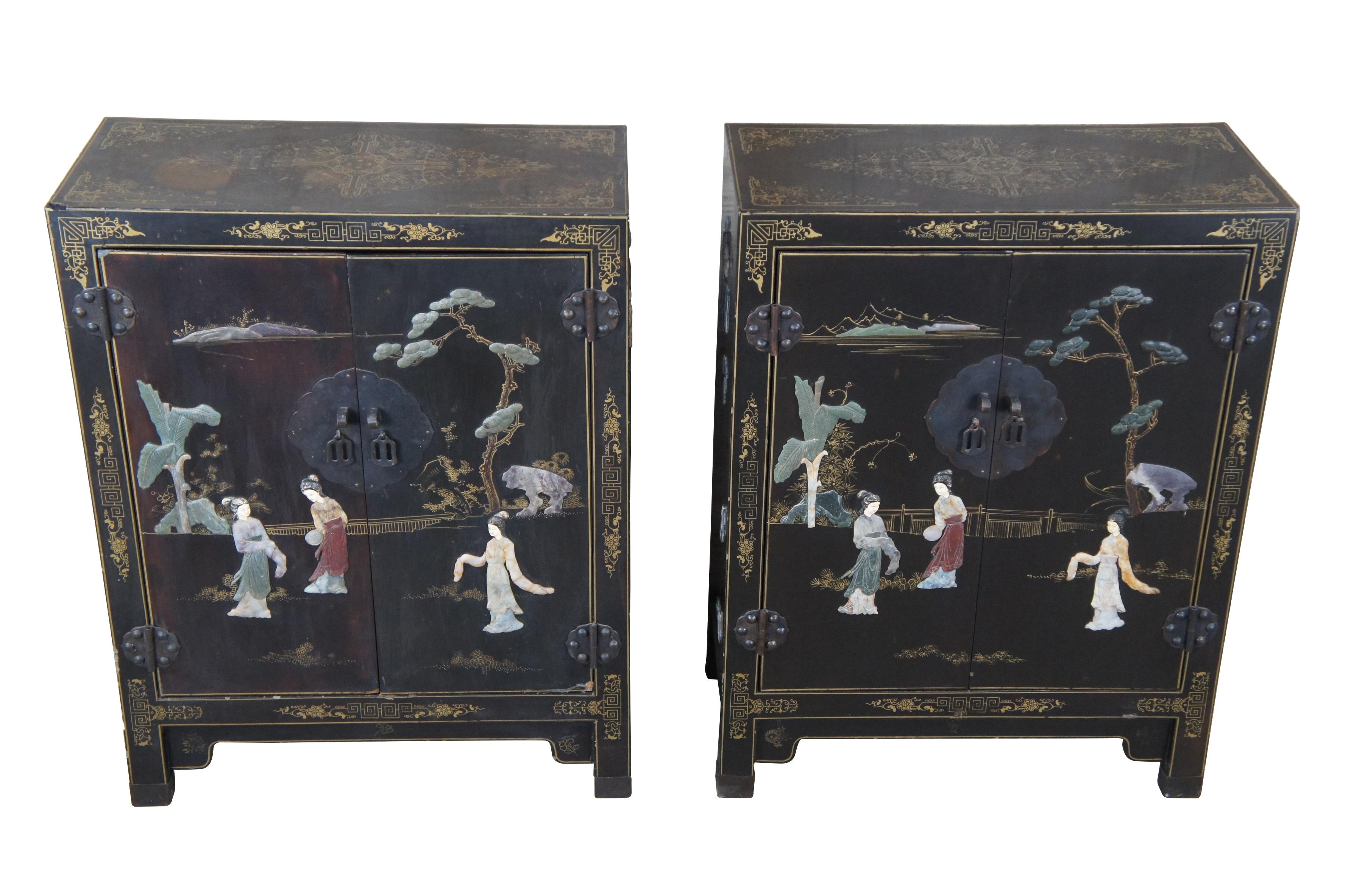 Magnificent pair of Chinese Lacquered Low Scholars Cabinets, circa second half 20th century. Double Doors Open to Single Shelf over shaped apron. Each features Carved Hardstone and intricate gold filigree / latticework designs with social scenes. 