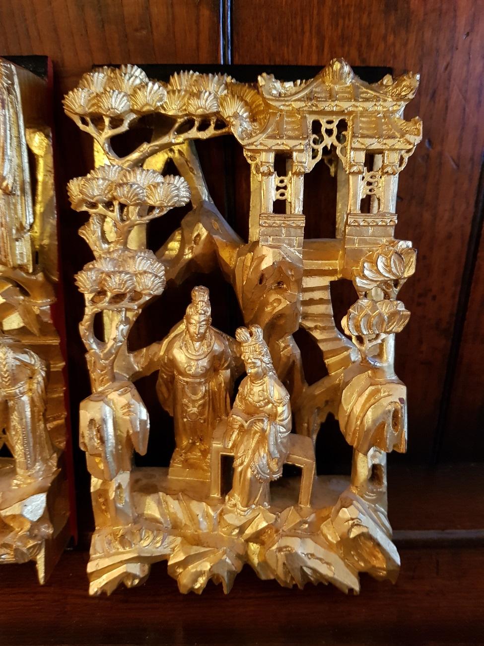 Hand-Carved 2 Chinese Gilded Wood Panels Depicting Persons and Temples For Sale
