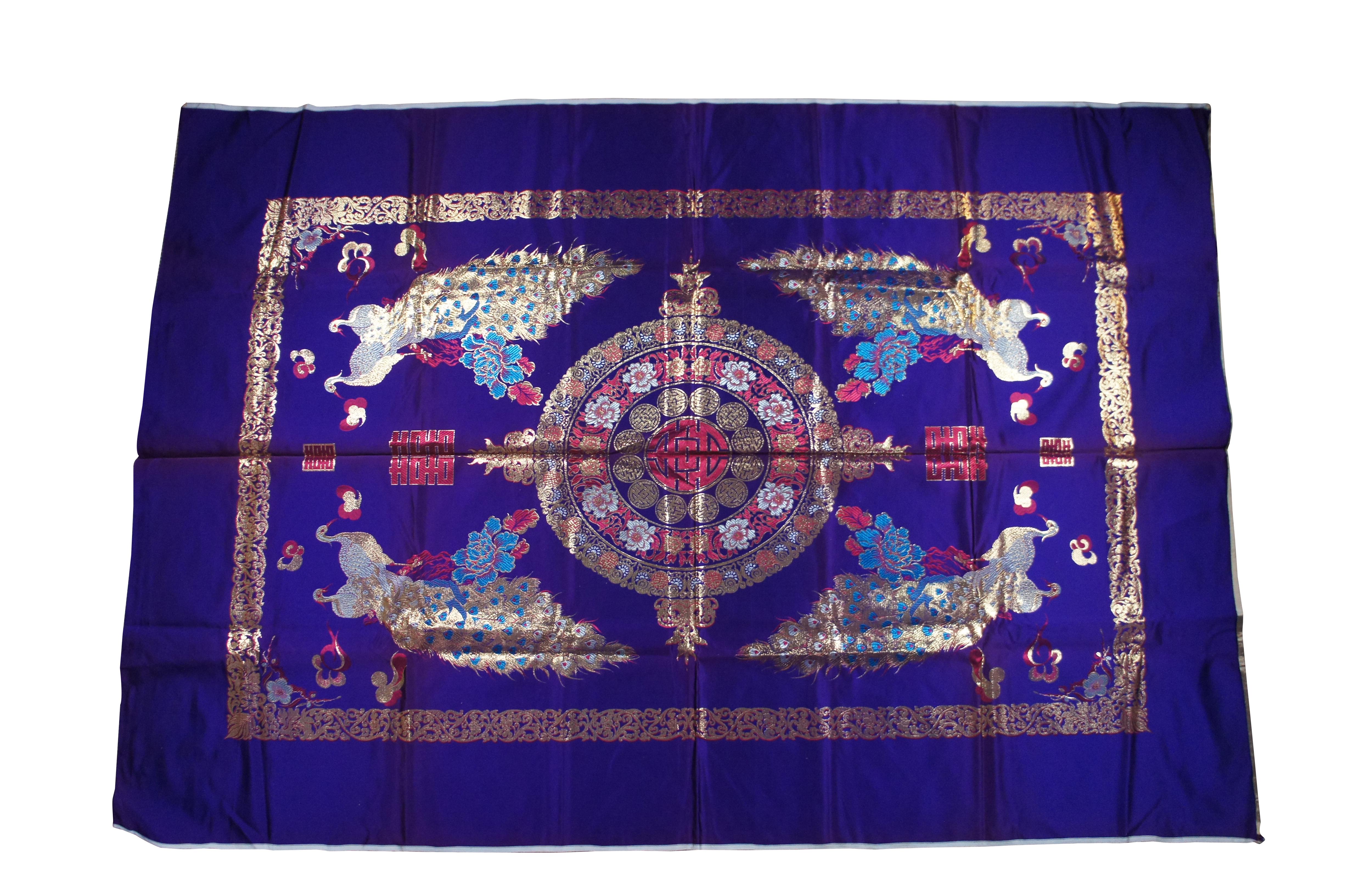 Two vintage Korean textile tapestries.  Made of silk featuring metallic gold embroidery with medallions, peacocks and dragons.  One purple, one green.  Wall hanging.  Tablecloth.

Dimensions:
Un-Hemmed - 83” x 59” / Hemmed - 75” x 57” (Length x