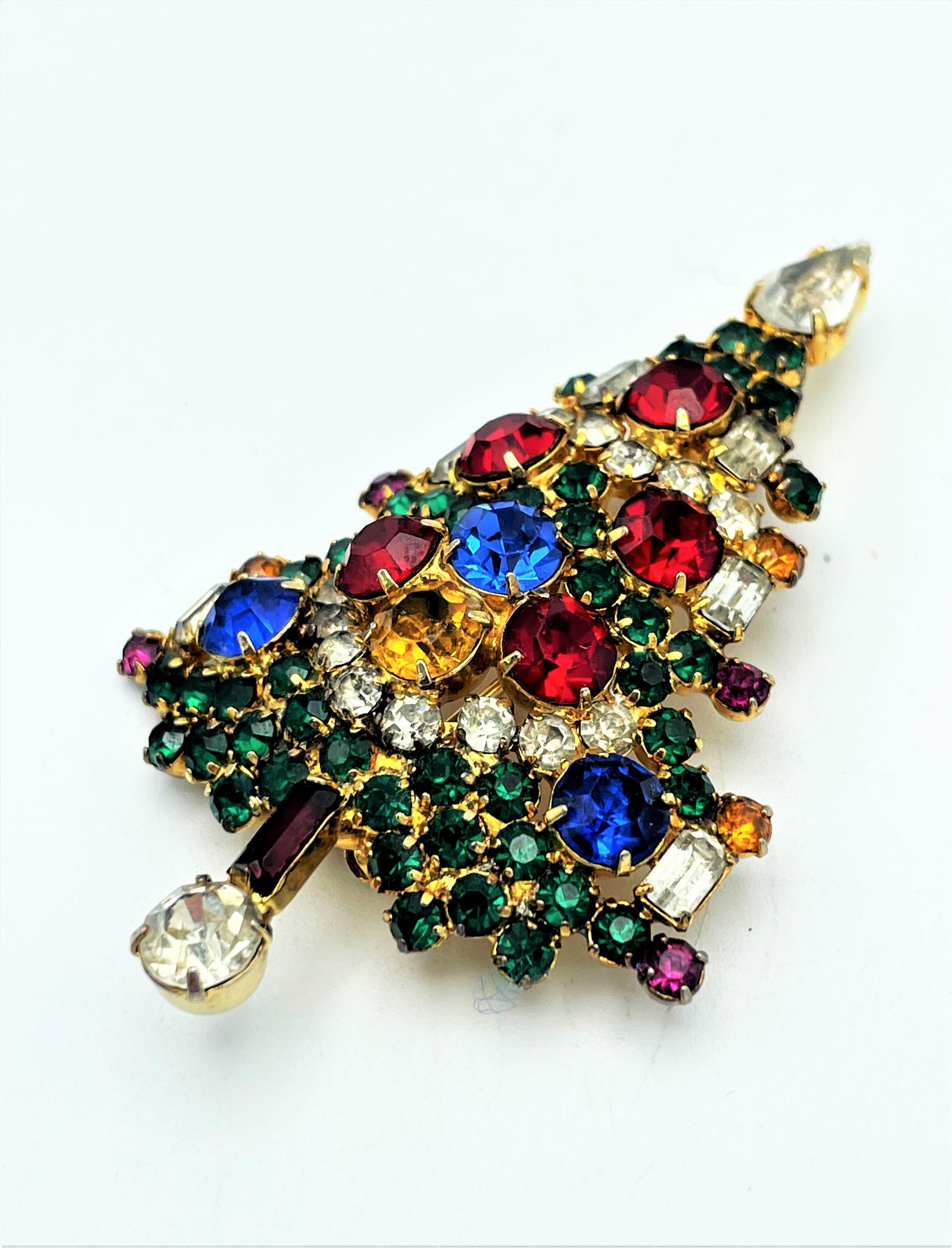 Round Cut 2 Christmas tree brooches, rhinestones on large and small on signed Warner US