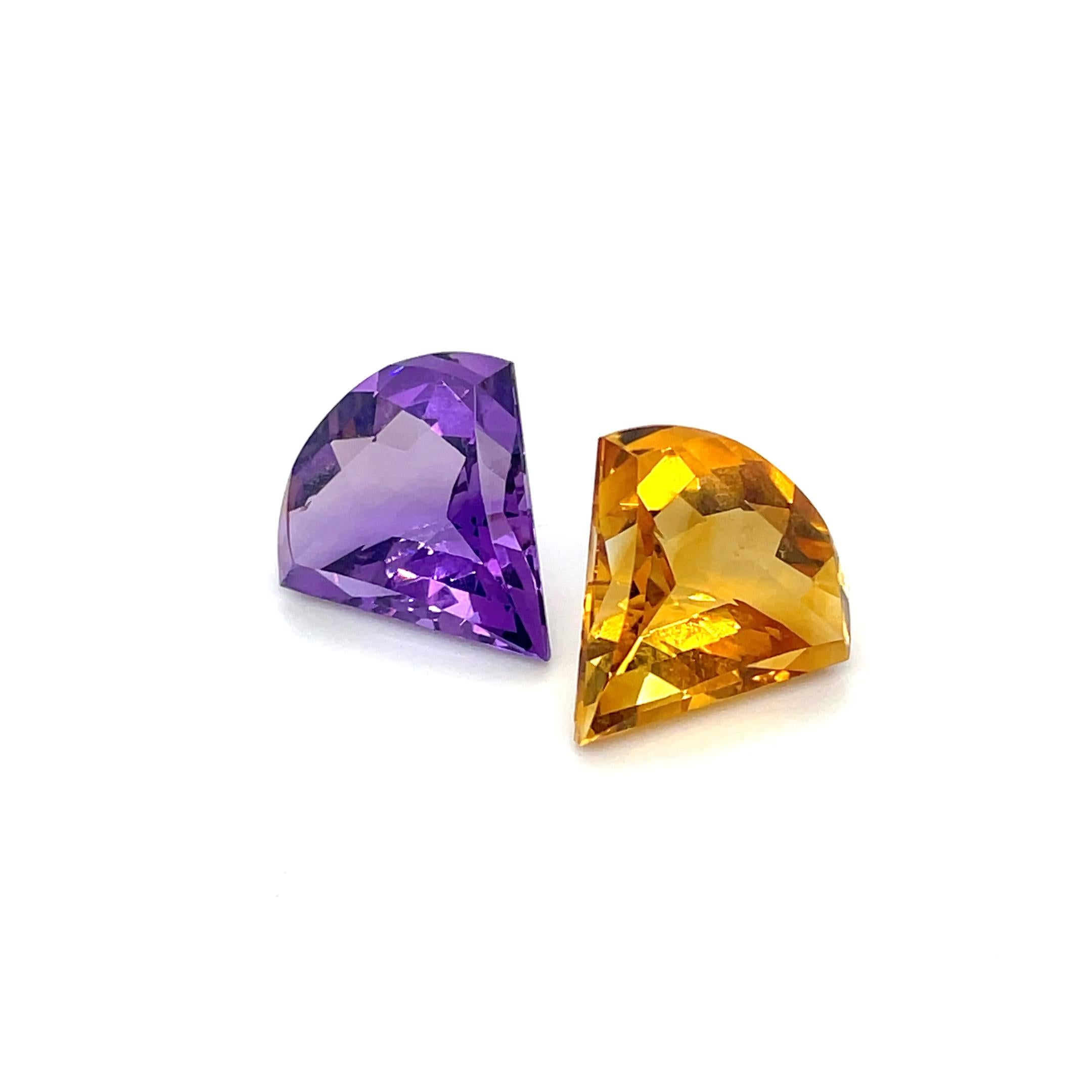 A radiant duo of Citrine and Amethyst, weighing 26.01 carats, sourced from the rich gemstone mines of Brazil. 

Citrine, known as the 