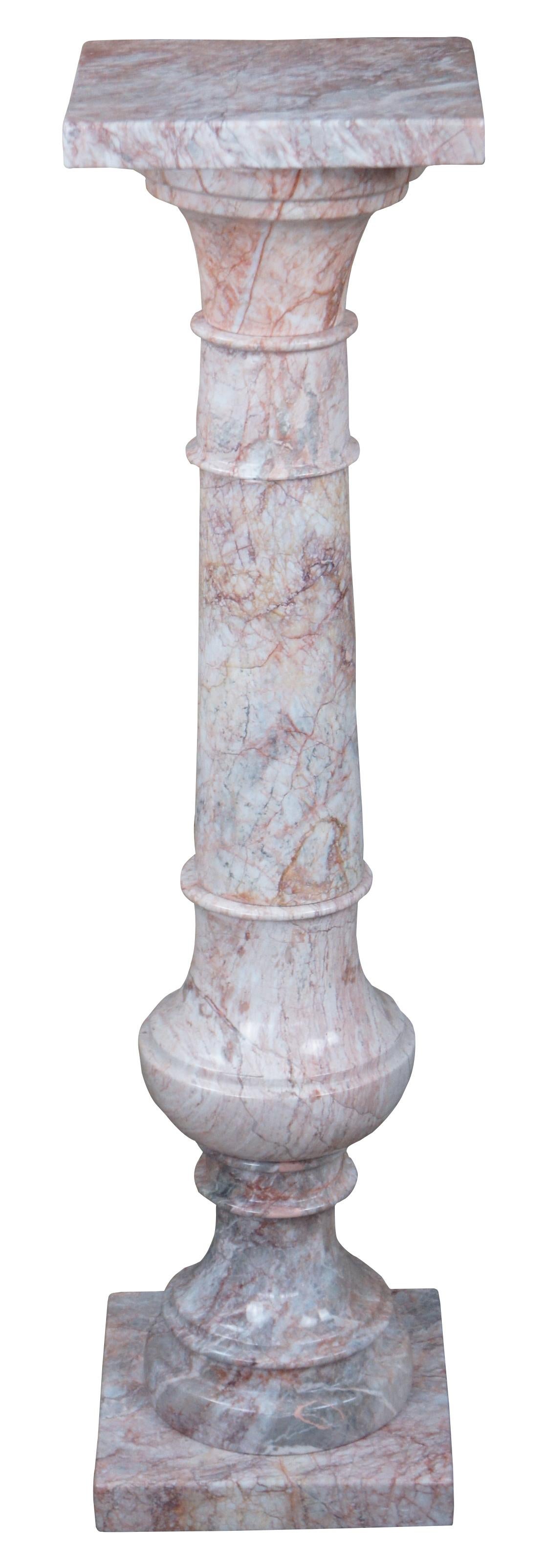 Pair of 20th century vintage Italian Classical Revival pink marble columns. An elegant trophy or baluster form with exceptional color. Made in Mexico.

Rouge Royal marble

The Red Royal marble quarry is located in Hautmont, Belgium. It is a