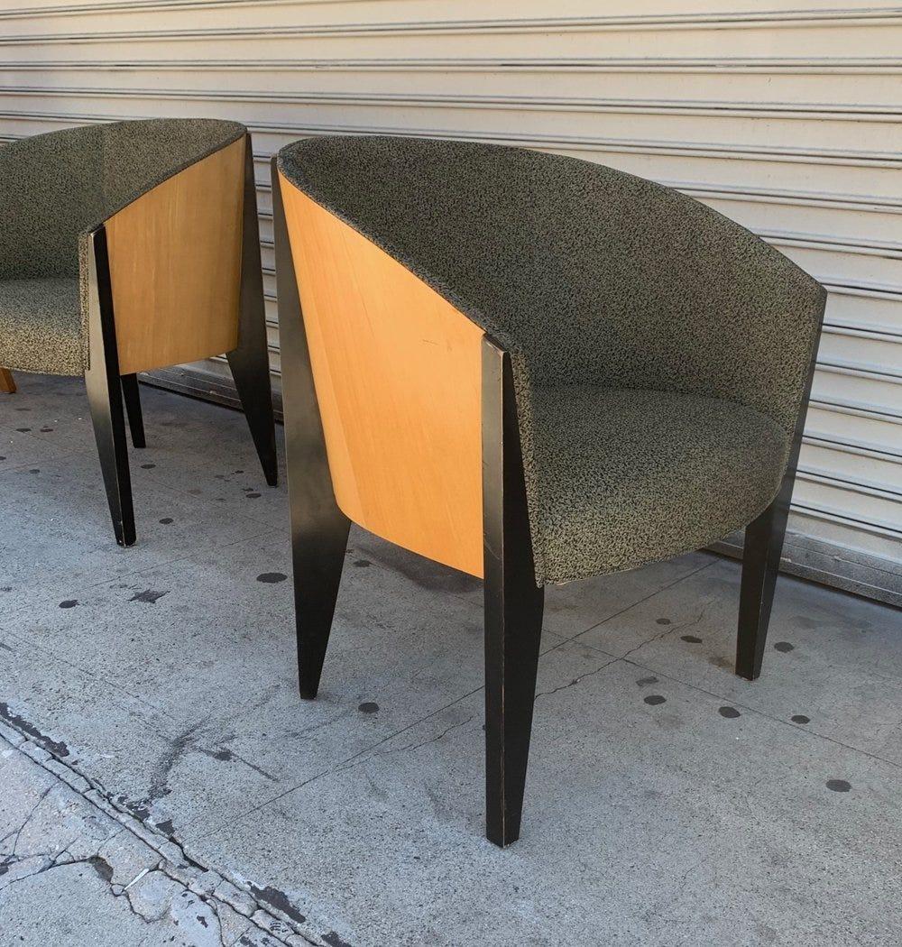 Beautiful pair of club chairs designed and manufactured in the USA by Bernhardt.

The chairs have molded maple wood backs and ebonized legs upholstered in a grayish fabric.

The chairs have beautiful architectural lines and are very