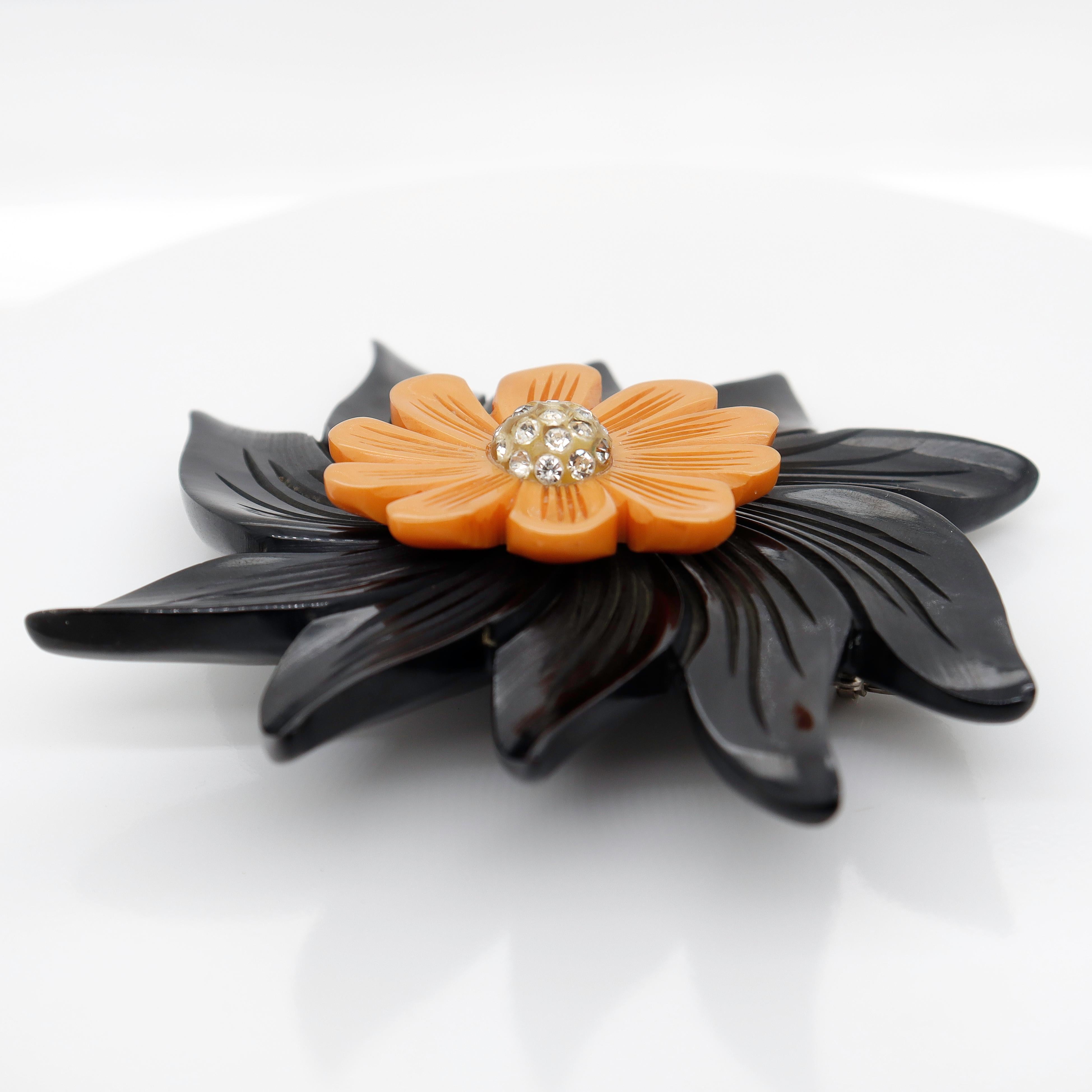 Art Deco 2-Color Black & Orange Bakelite Flower Brooch or Pin with Rhinestones For Sale