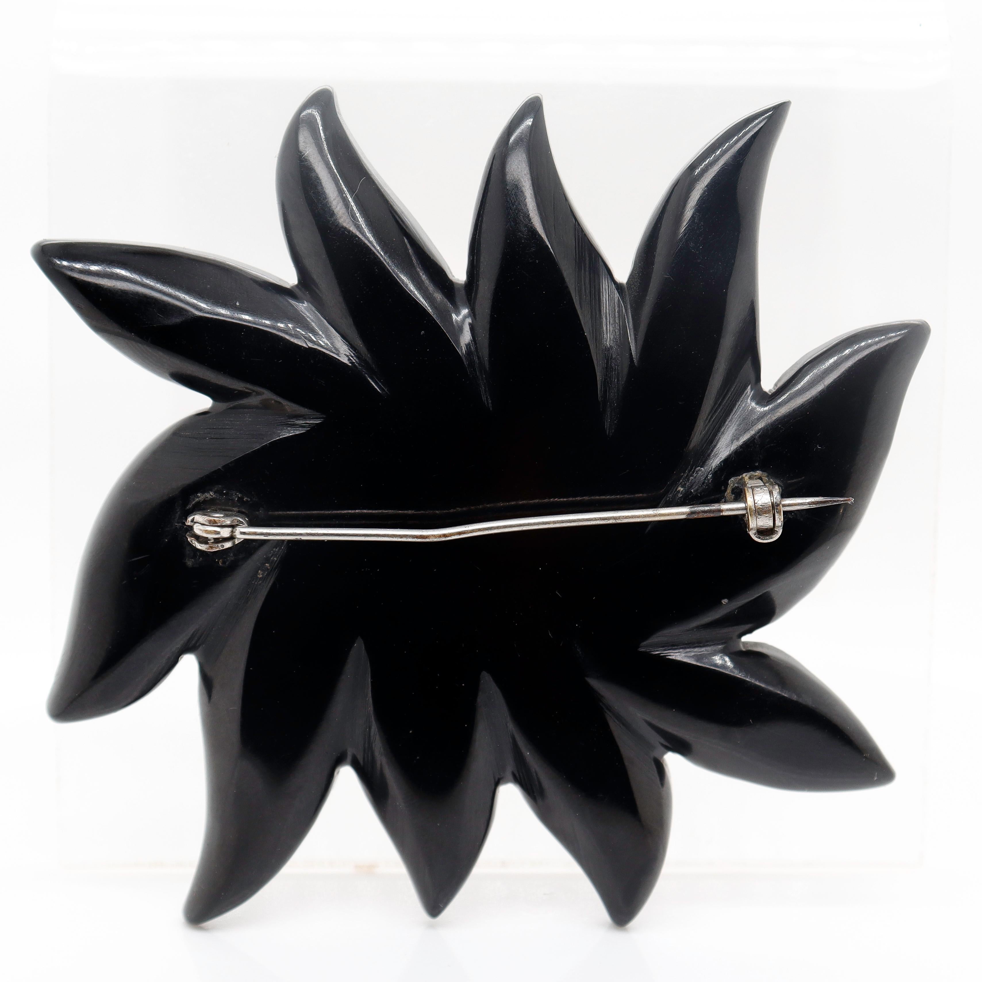 Women's or Men's 2-Color Black & Orange Bakelite Flower Brooch or Pin with Rhinestones For Sale