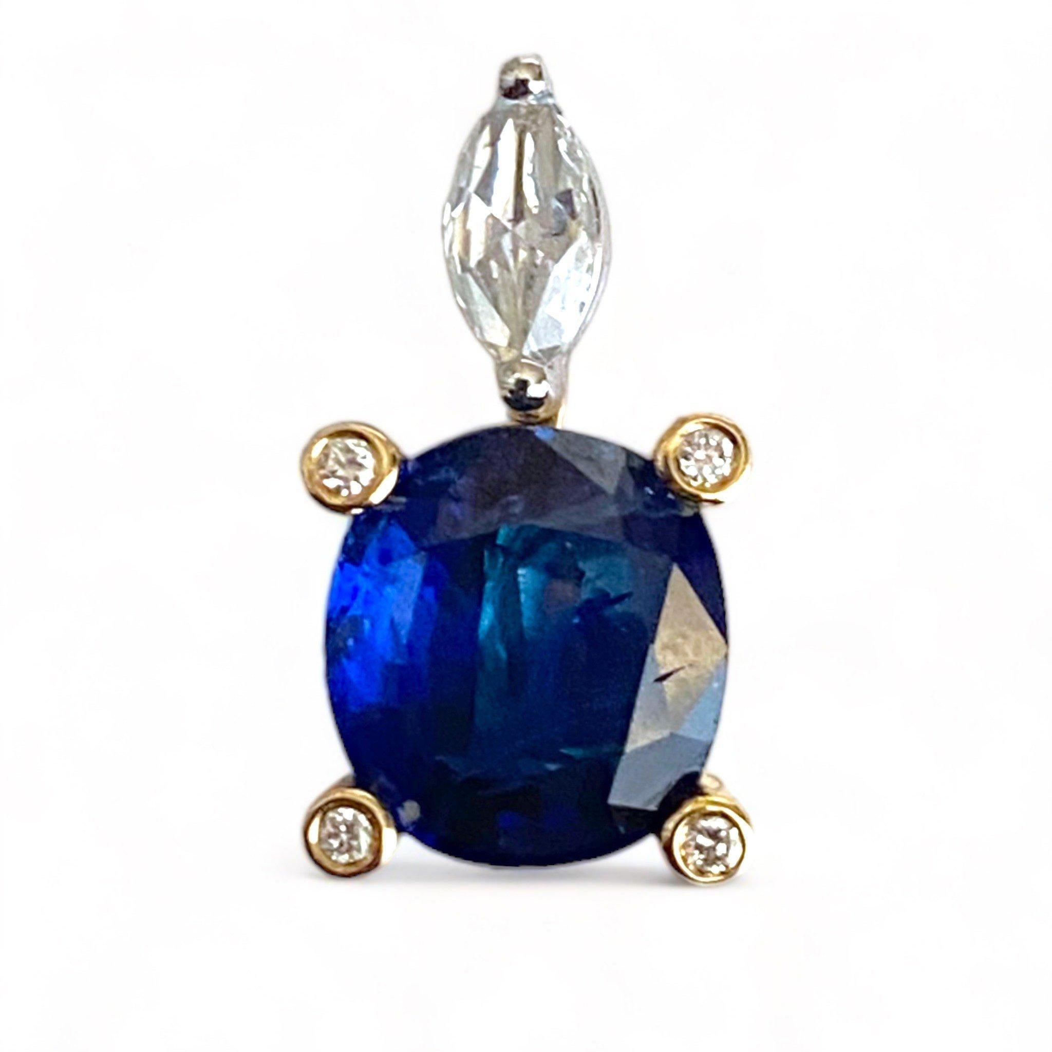 2 ct Blue Sapphire drop pendant with scintillating marquise shape rose cut solitaire and round diamonds on a solid gold 20 inch 14 k yellow gold link chain.

Pendant comes with chain.

Drop is approximately 15  mm x 8 mm