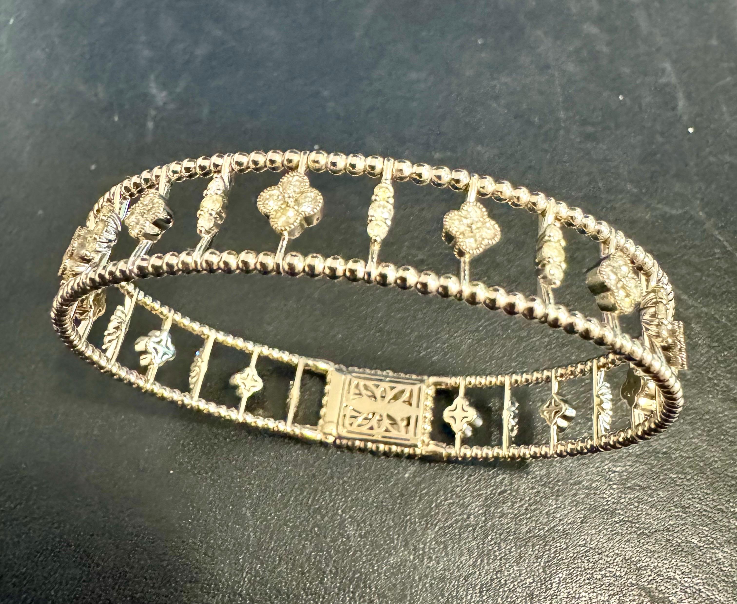 This listing is for a single bangle , not a pair
I have a pair available in white gold 
2 Ct Brilliant Cut Diamond Metro Women 14 Kt White Gold Diamond Bangle Bracelet
Streamlined and modern, this Metro collection twinkles like a nighttime city