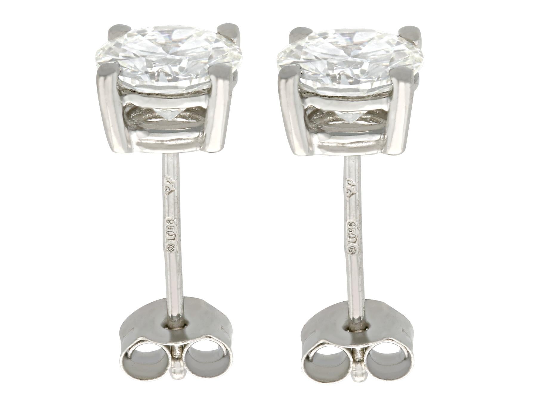 A stunning pair of antique 1920s 2.00 carat diamond and contemporary platinum stud earrings; part of our diverse diamond jewelry and estate jewelry collections

These stunning, fine and impressive diamond stud earrings have been crafted in