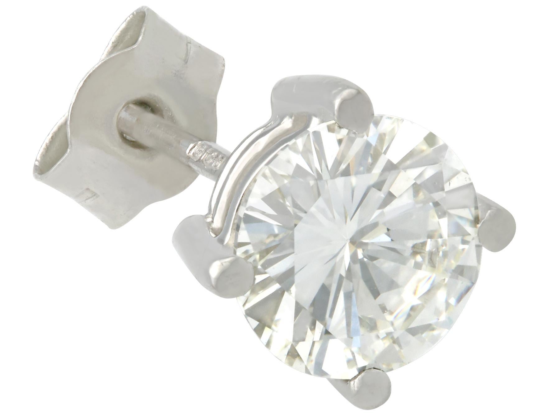 Round Cut 2 Carat Diamond and Platinum Stud Earrings