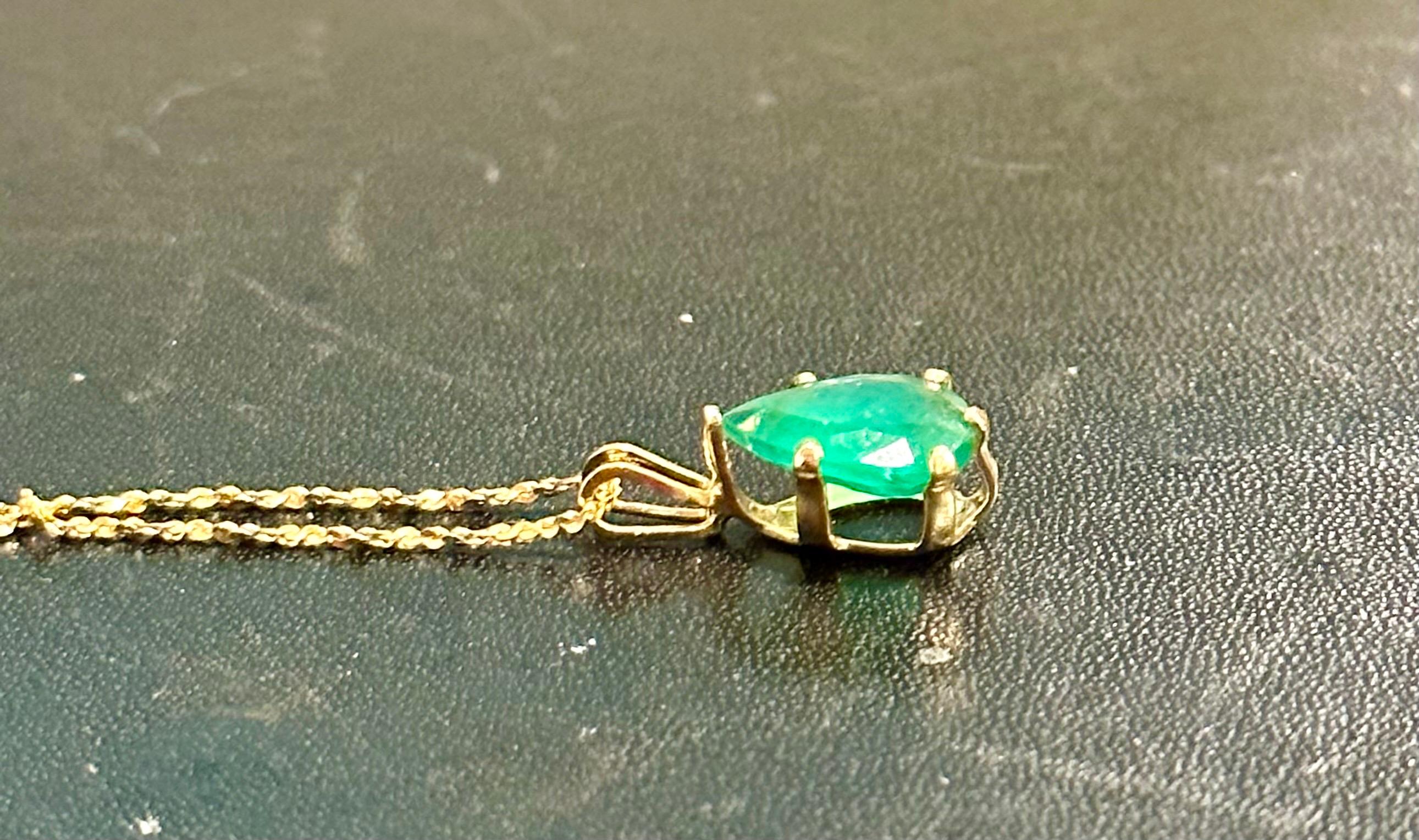 Approximately 2.25 Ct Natural Emerald Zambian emerald  Pendant 14 Karat Yellow  Gold  with Chain

 Emerald is about 2,25 carat 
Very desirable color and quality. Extreme fine color and clarity.
comes  in  a 14 Karat Yellow gold chain  stamped on