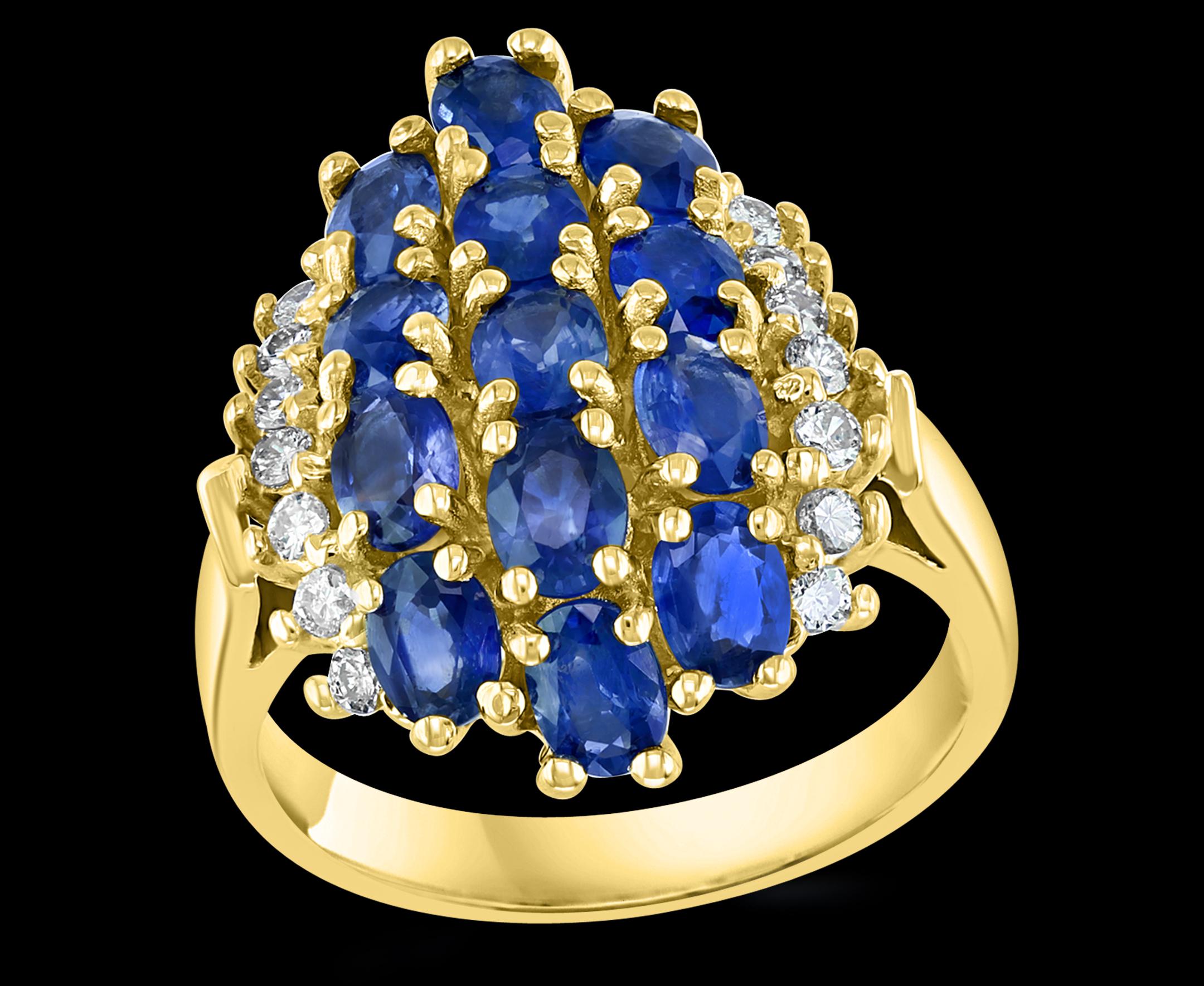 Approximately 2 Ct Oval Blue Sapphire &  Diamond Cocktail Ring in 14 Karat Yellow Gold Estate
three rows of oval  natural sapphires .
Round Brilliant cut diamonds on both side of the sapphires.
14 Karat yellow Gold 6 Grams
Ring Size 4.75 ( it can be