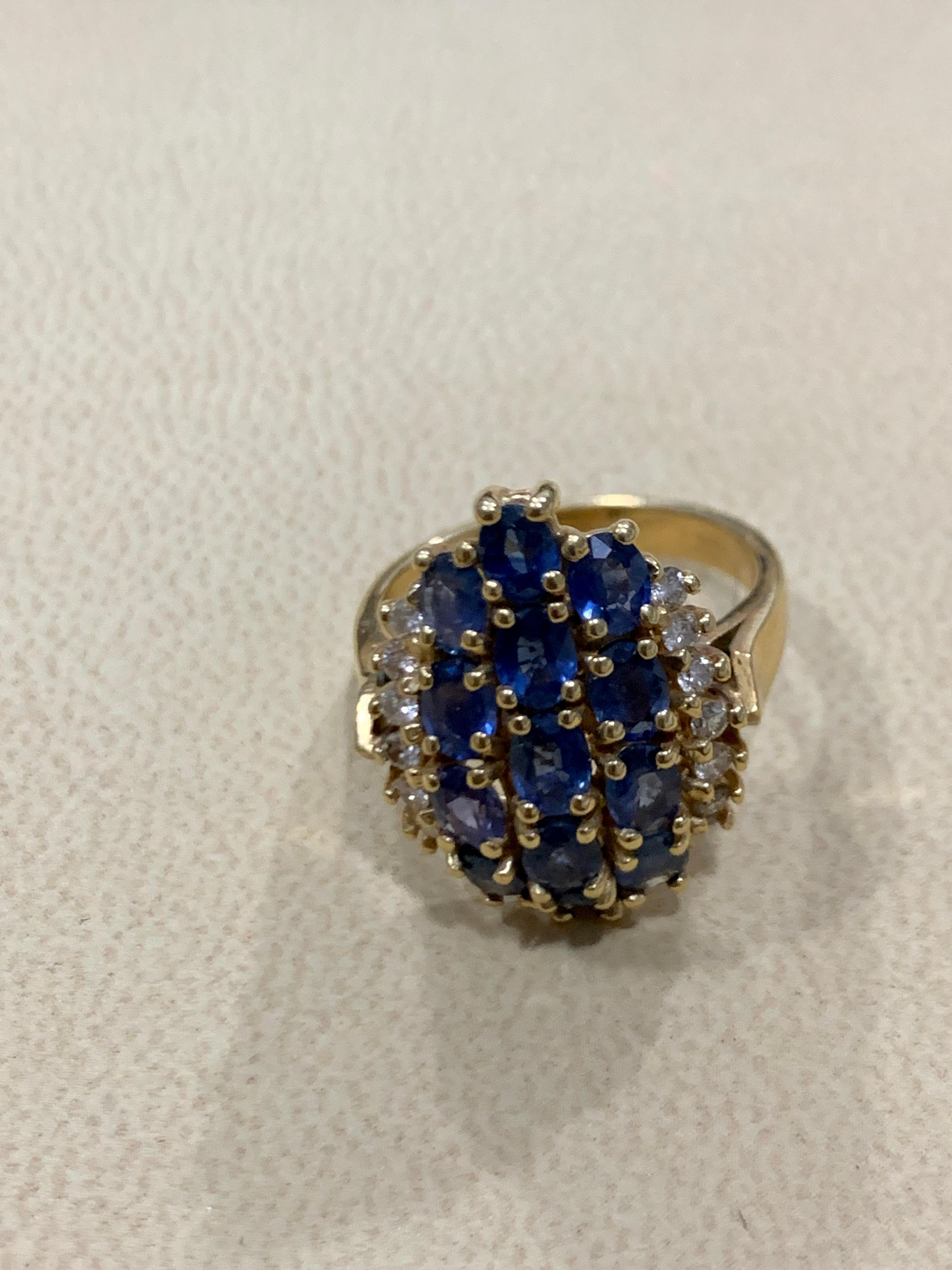 Women's 2 Carat Oval Blue Sapphire and Diamond Cocktail Ring in 14 Karat Gold Estate For Sale