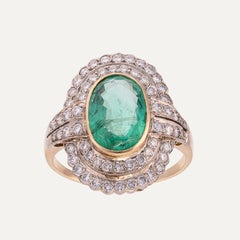 2 ct Oval Emerald and Diamond Halo Yellow Gold Ring