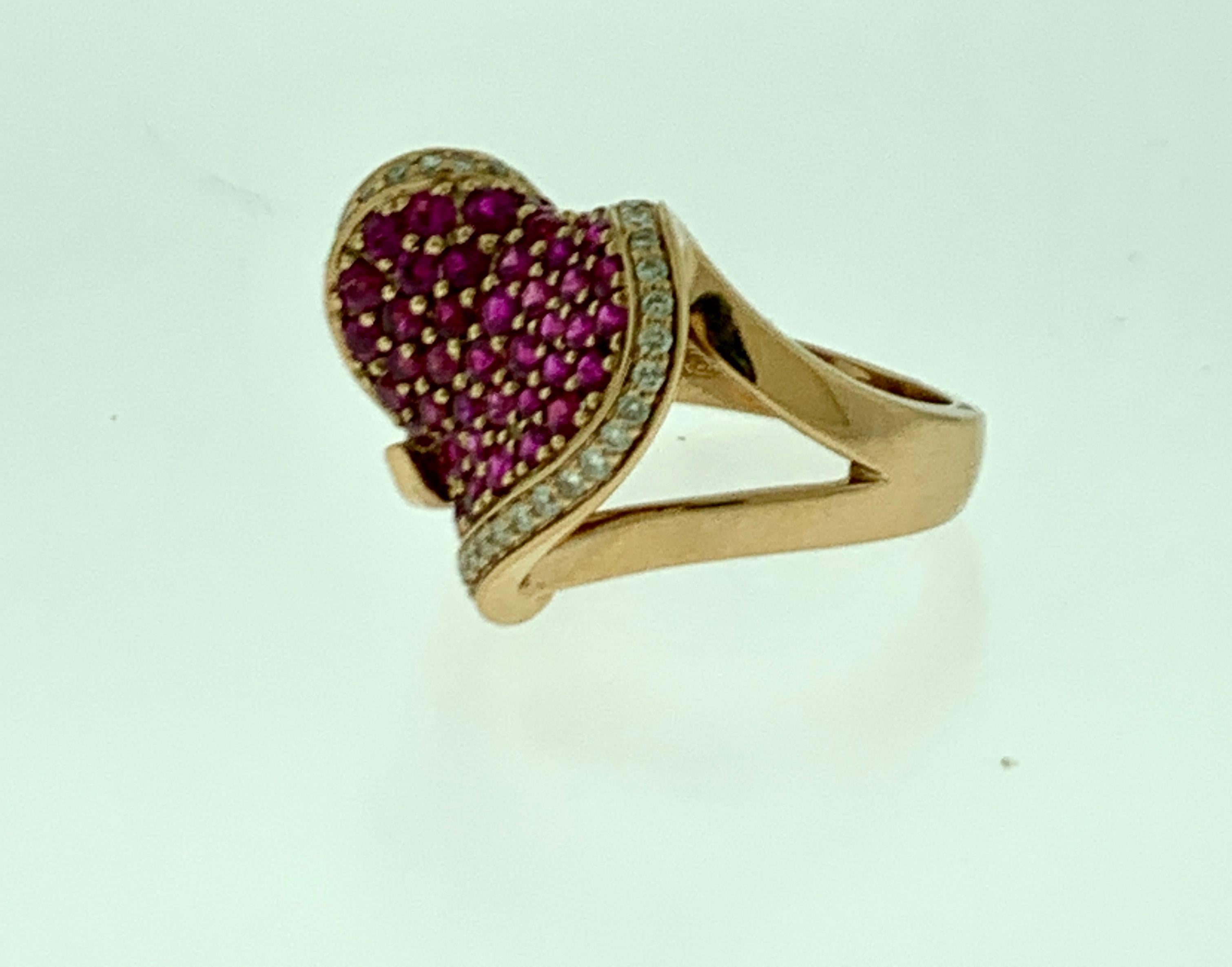Women's 2 Carat Ruby and 0.75 Carat Diamond 18 Karat Rose Gold Heart Shape Ring For Sale